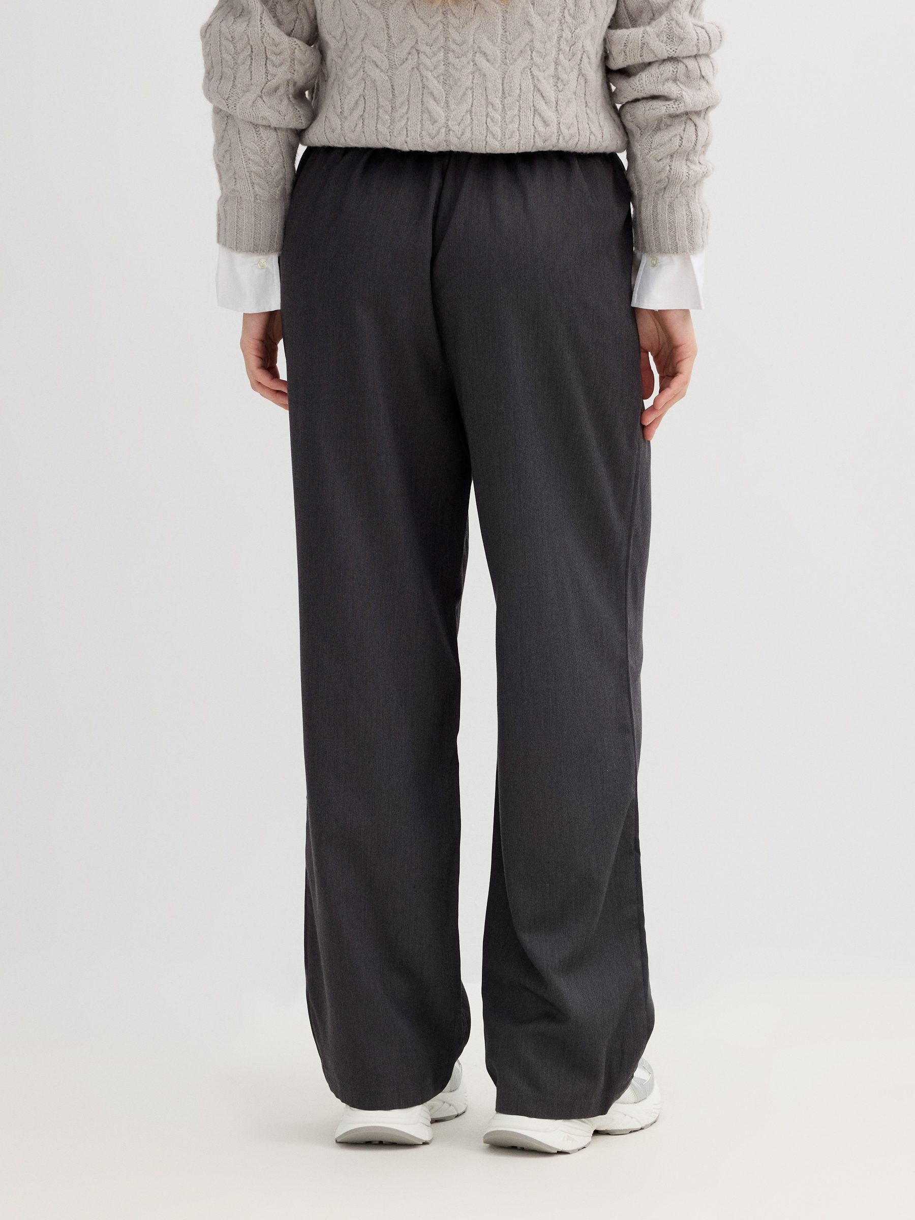 Palazzo pants with tie dark grey front view