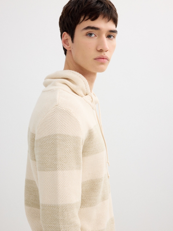 Striped knit sweater raw detail view