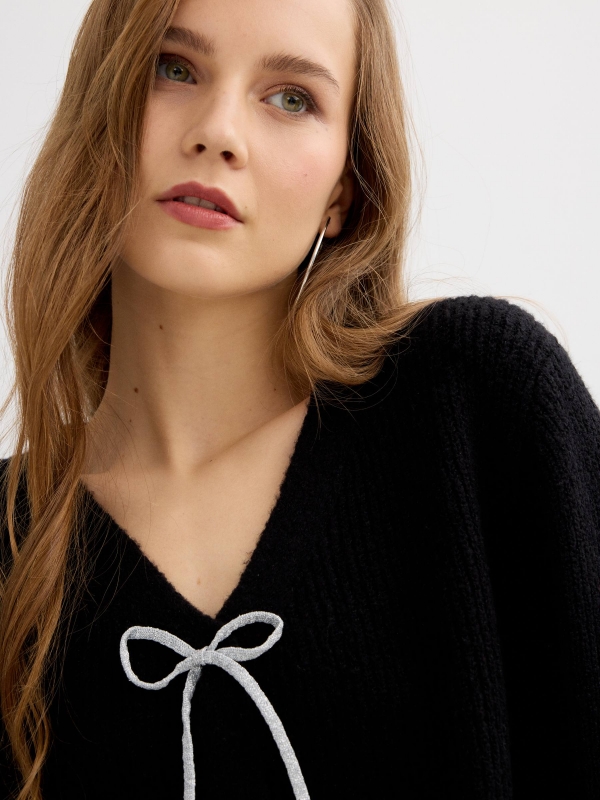 Knit jacket with rhinestone tie black detail view