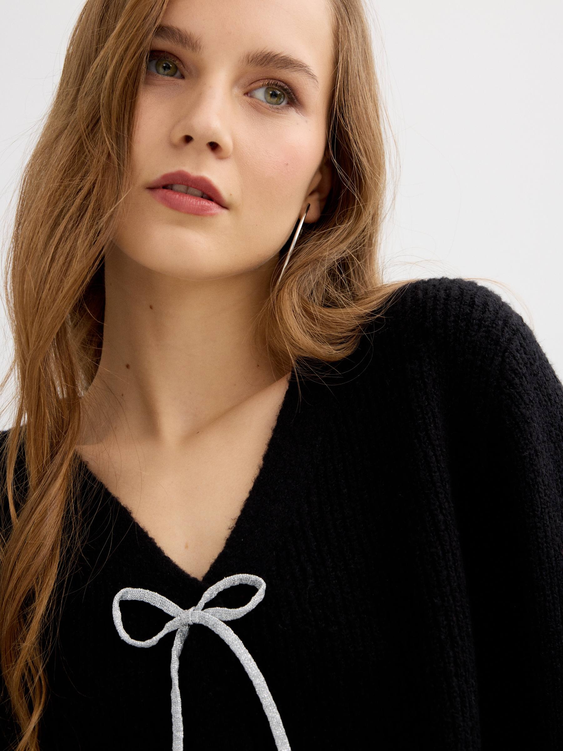 Knit jacket with rhinestone tie black middle front view