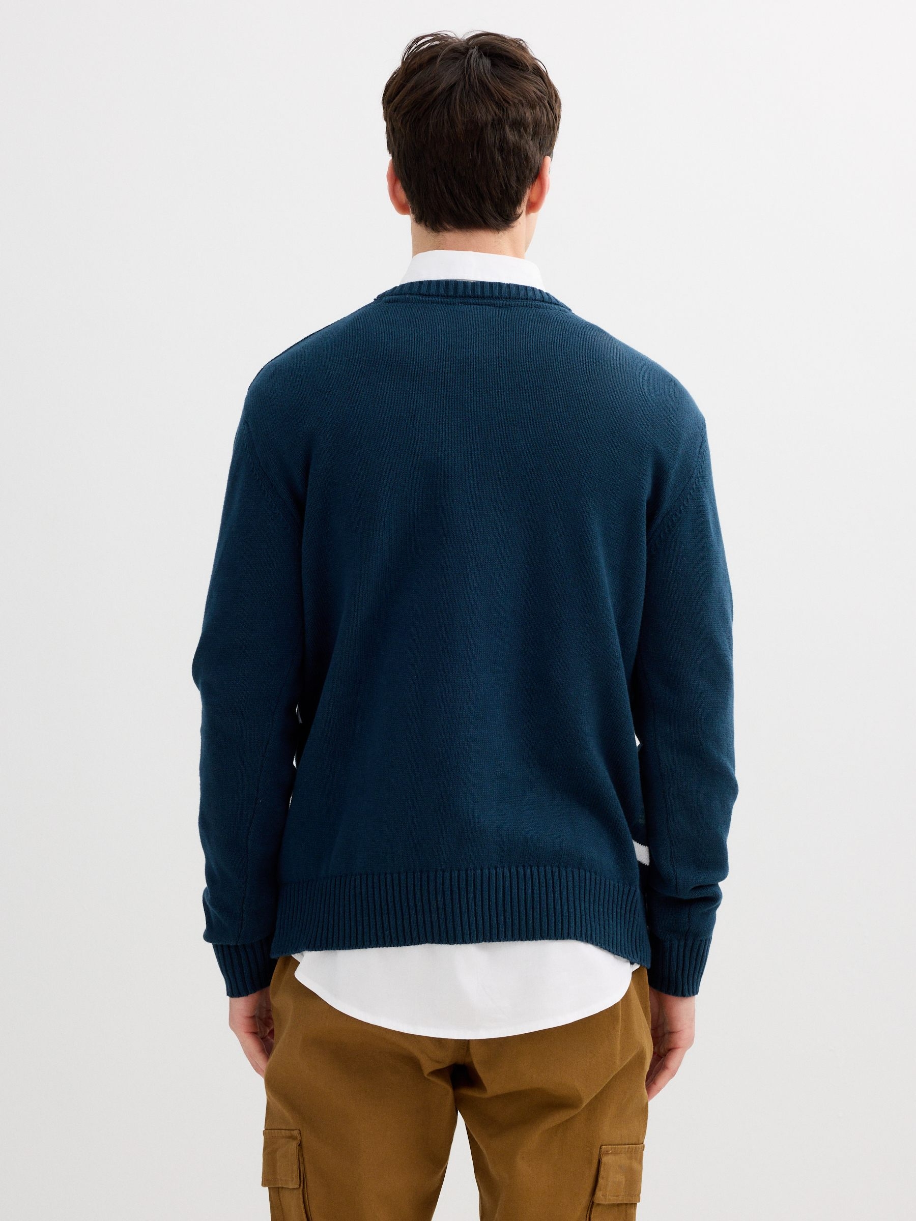 Striped knit sweater with a round neck navy middle front view