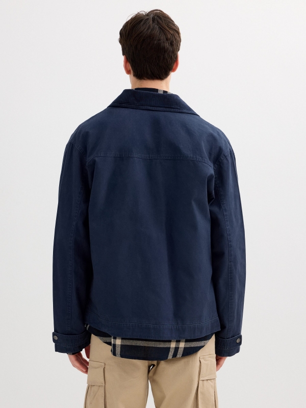 Blue jacket with zipper navy middle back view