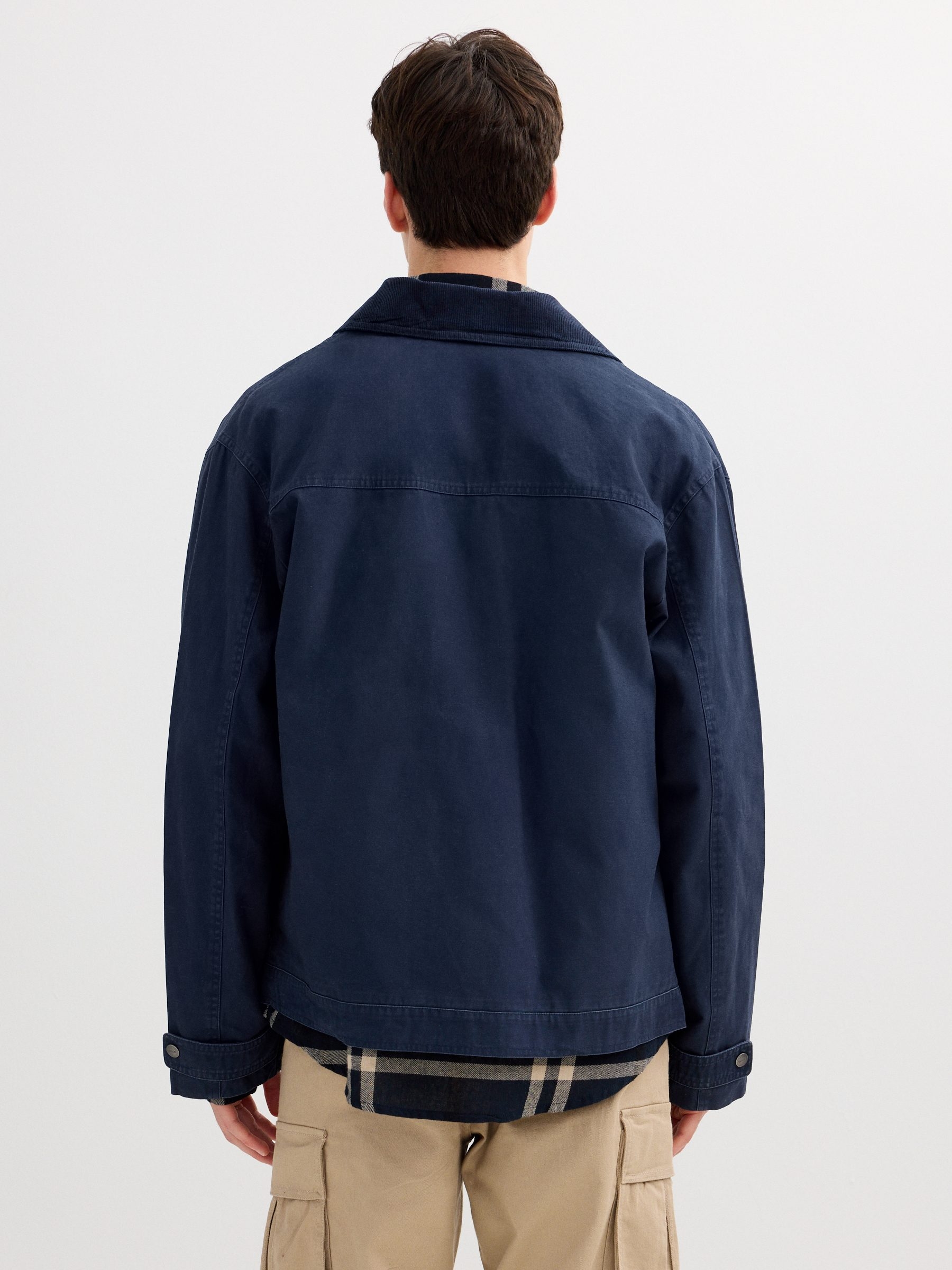 Blue jacket with zipper navy middle front view
