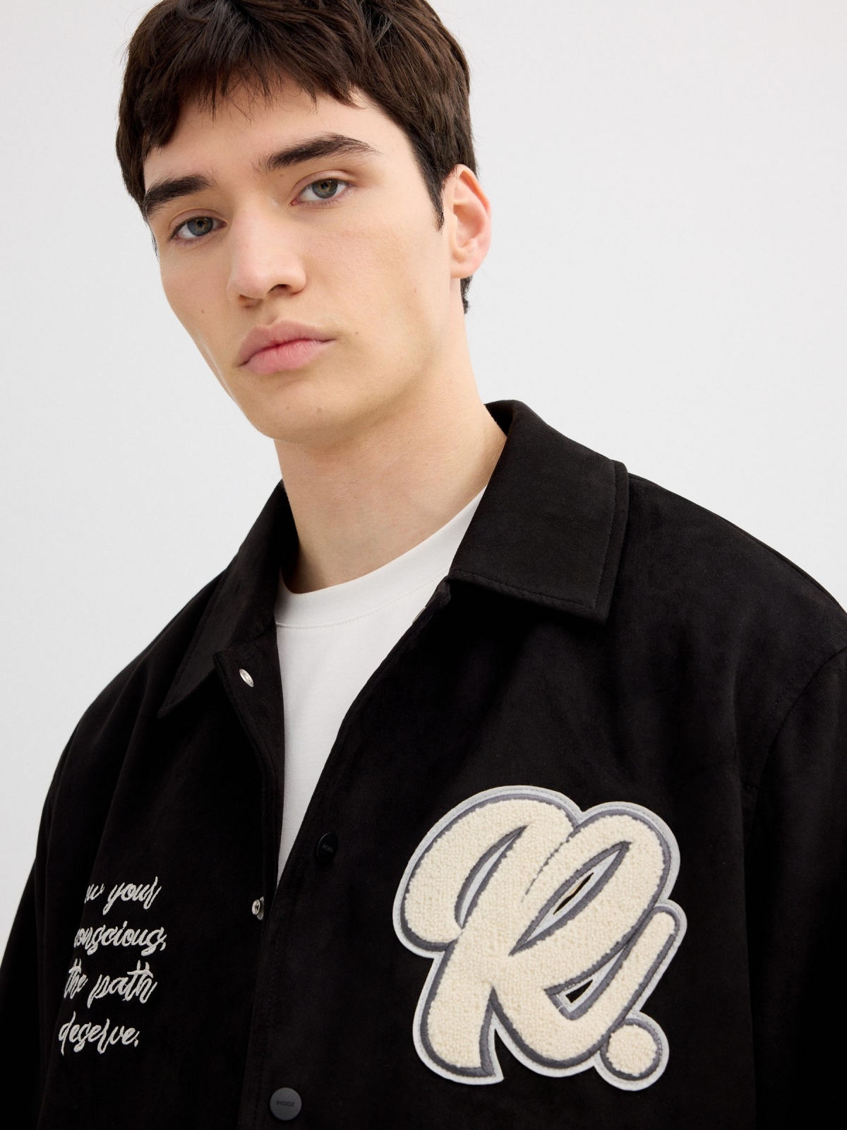 Varsity jacket leather effect with buttons black detail view