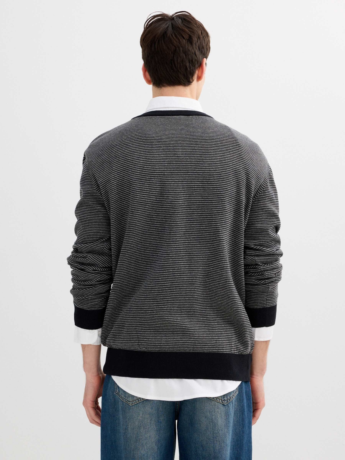 Striped knit sweater with a round neck black middle back view