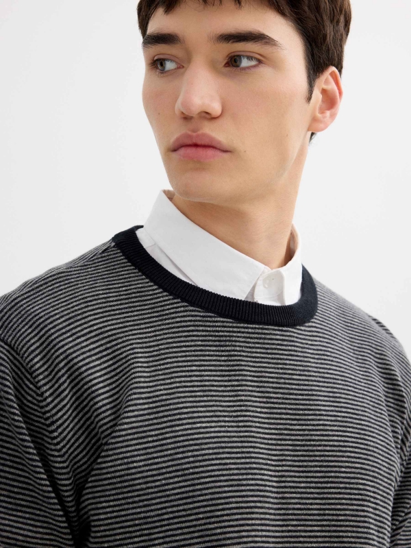 Striped knit sweater with a round neck black detail view