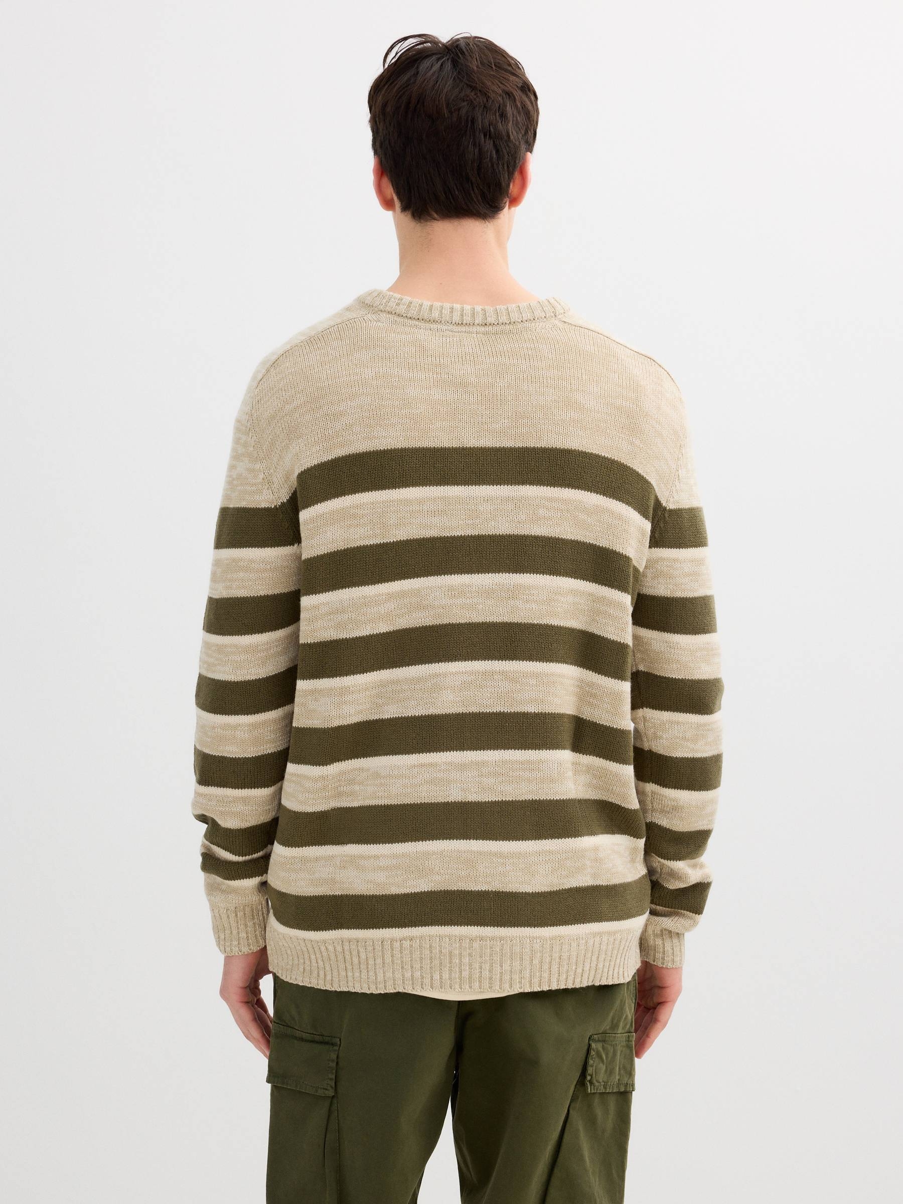 Striped knit sweater raw middle front view