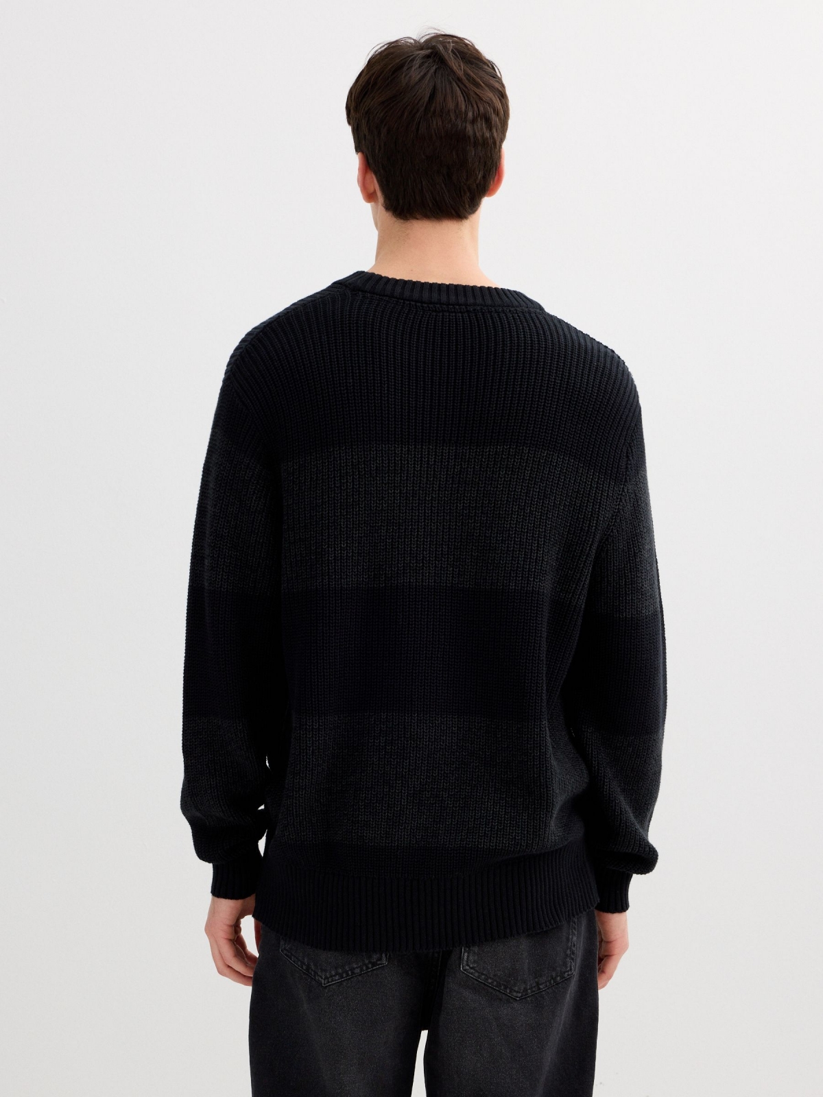 Striped knit sweater with a round neck black middle back view