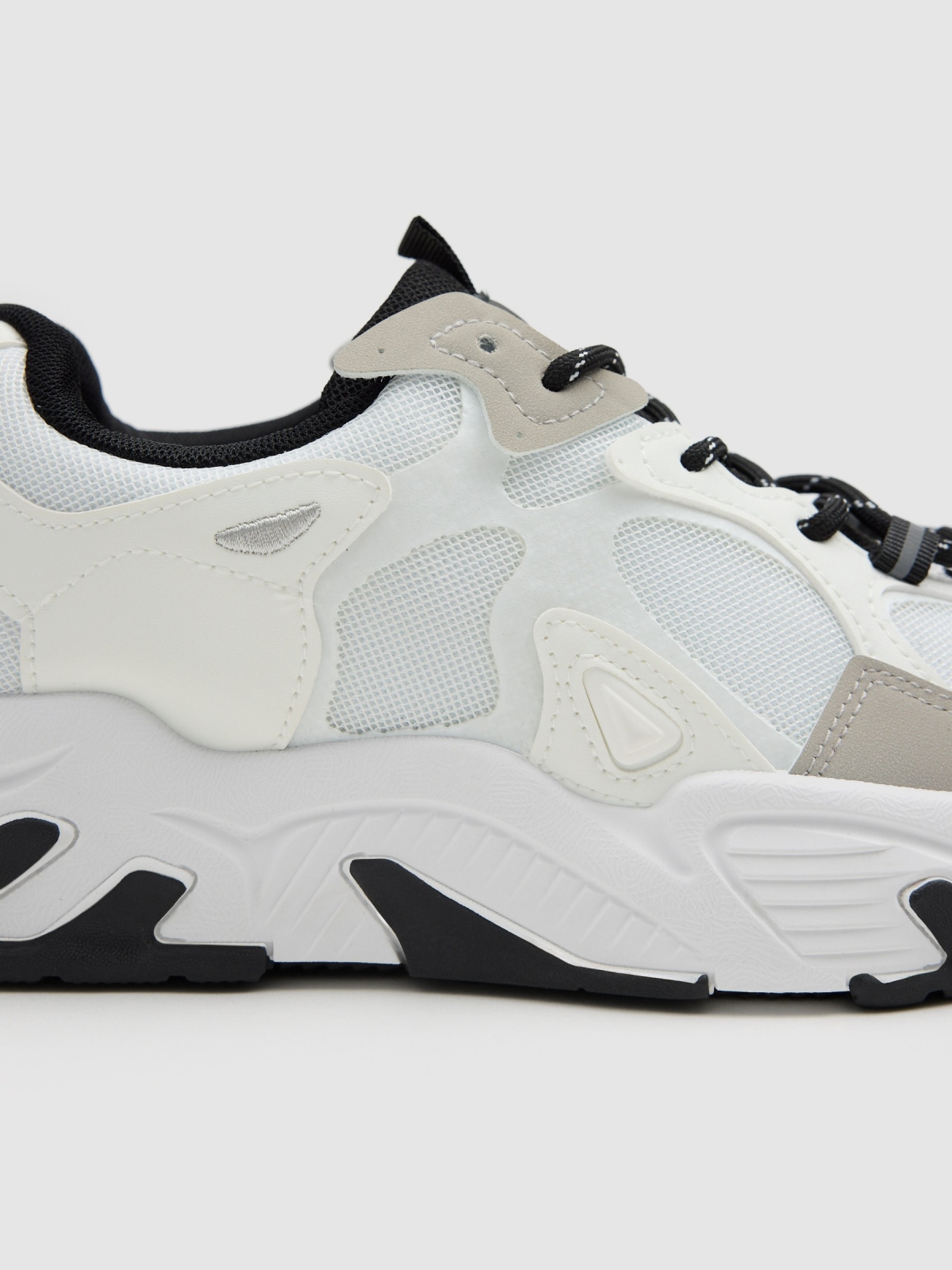 Nylon and rubber sneakers off white detail view