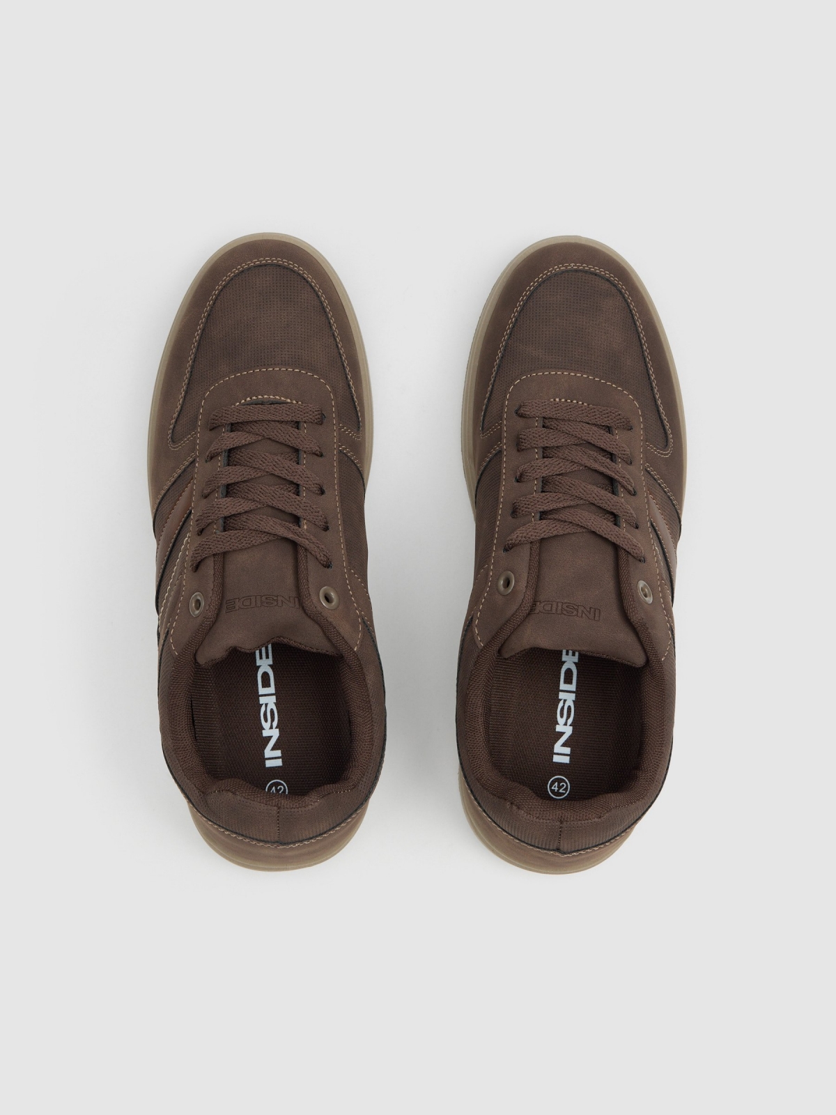 Synthetic leather sports shoes with rubber sole dark brown zenithal view