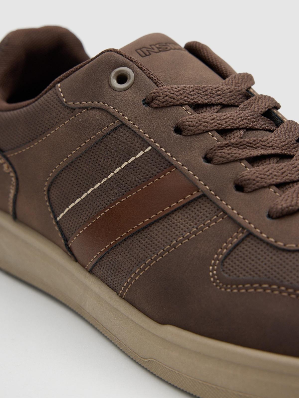 Synthetic leather sports shoes with rubber sole dark brown detail view