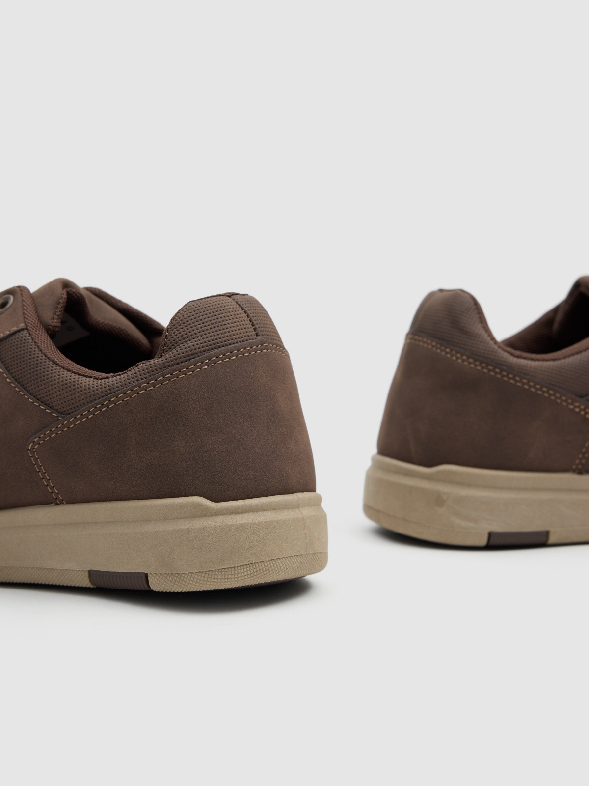 Synthetic leather sports shoes with rubber sole dark brown detail view