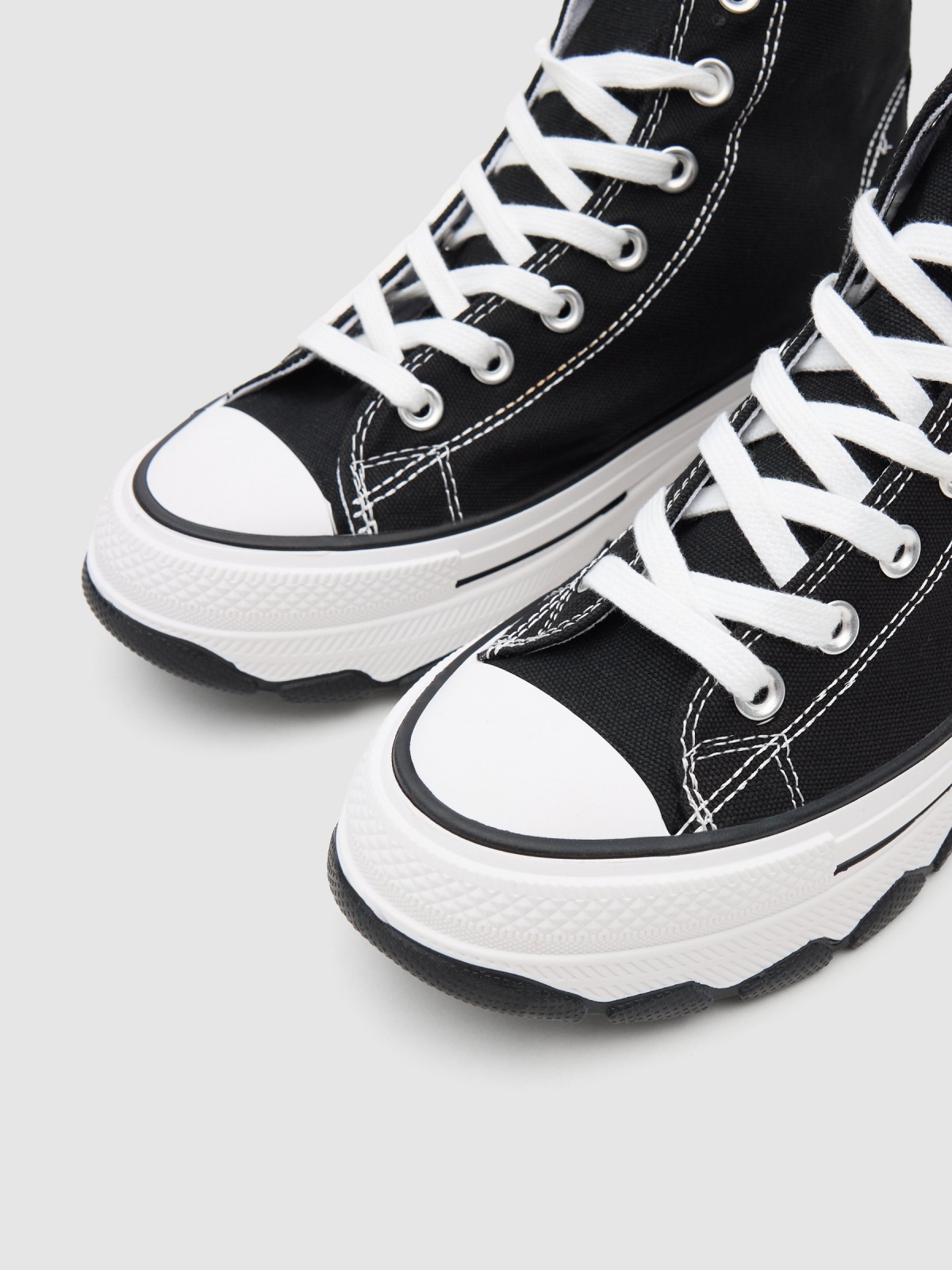 Black canvas bootie black detail view