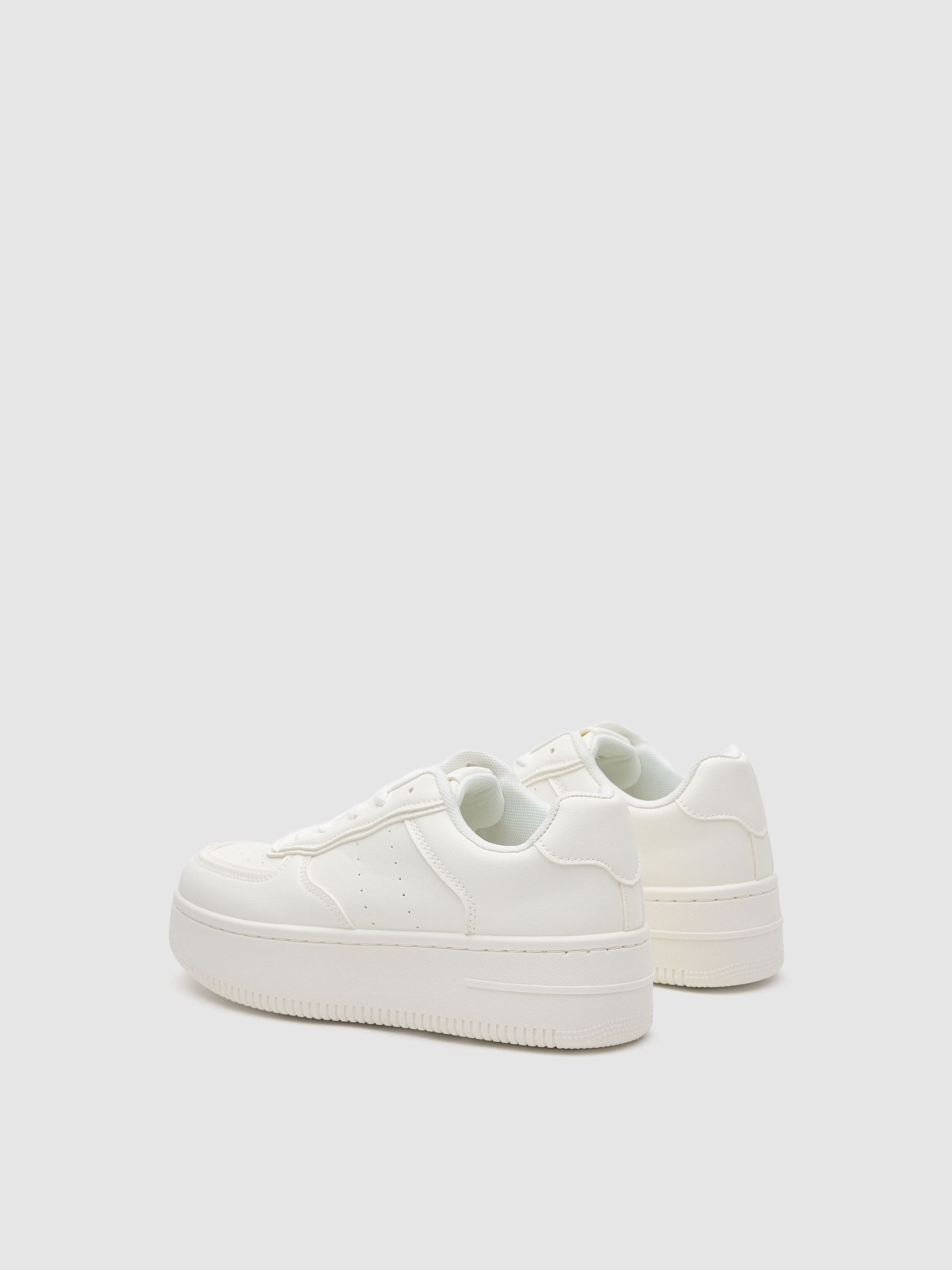 Faux leather sports shoe with platform white
