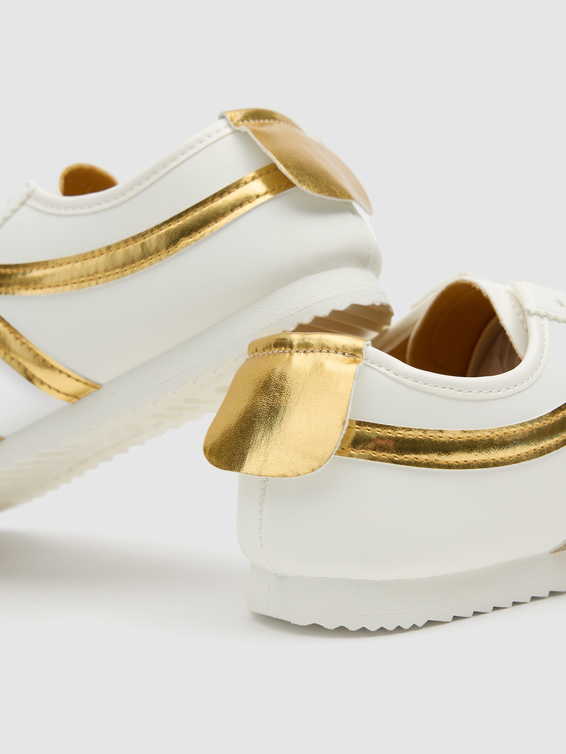 Faux leather sports with golden details golden