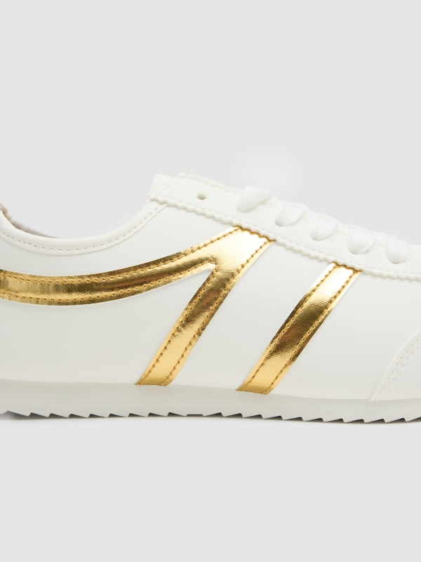 Faux leather sports with golden details golden detail view