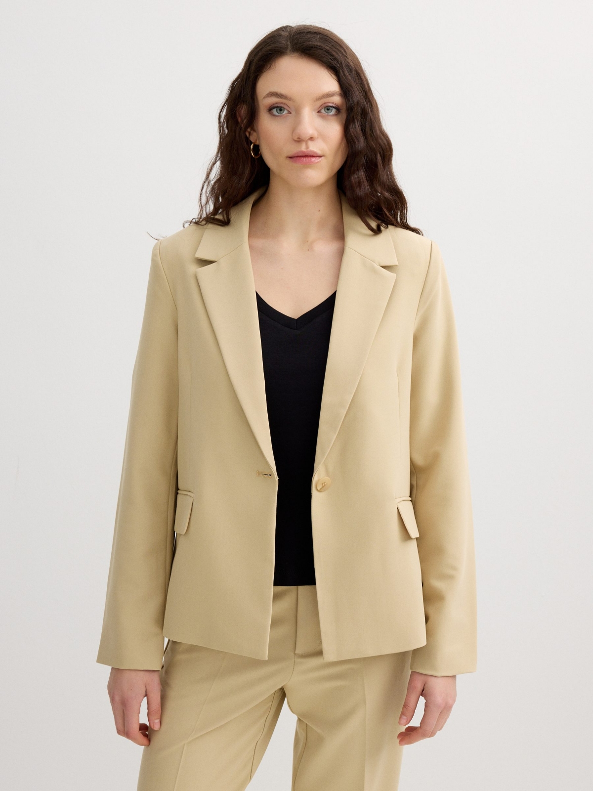 Blazer with shoulder pads sand middle front view