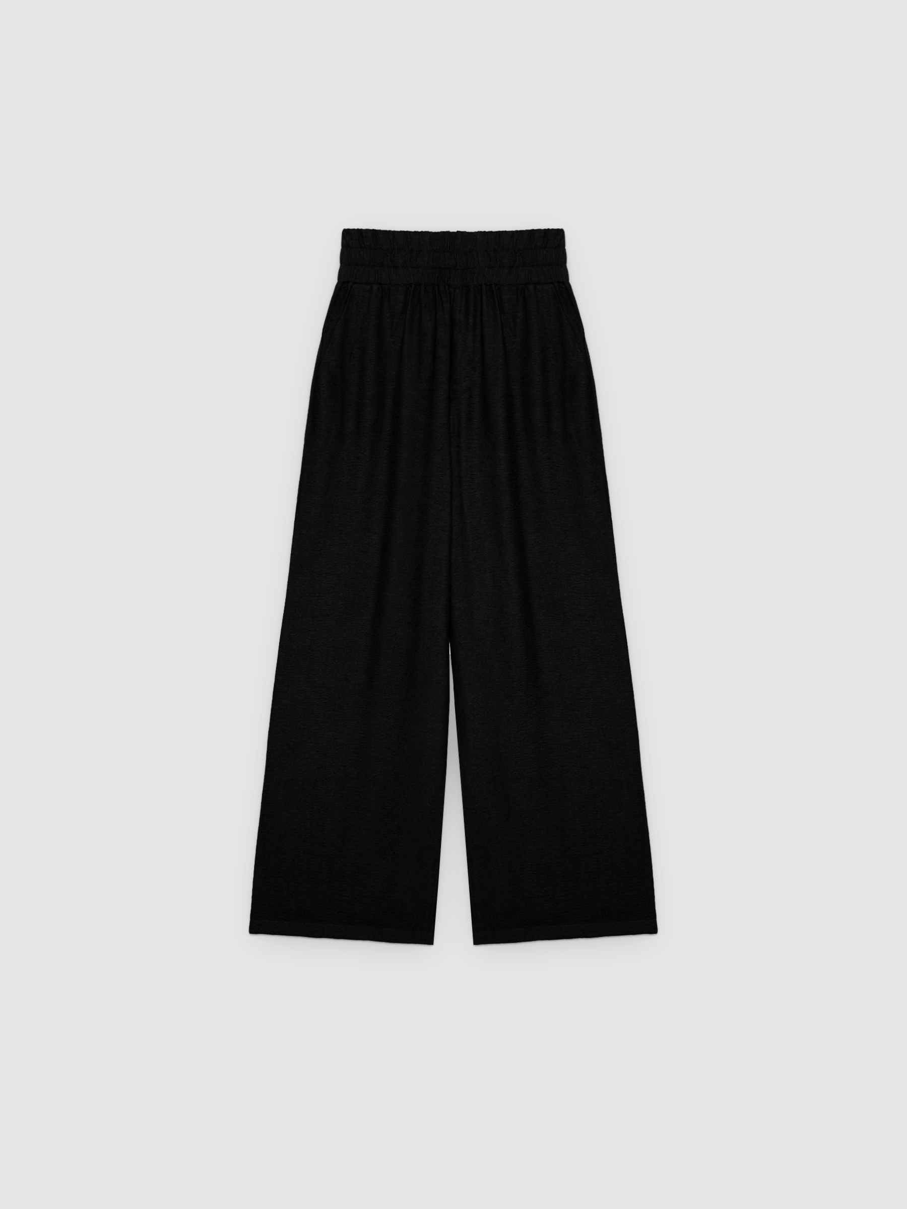 Pantalón wide leg fluido negro vista general frontal