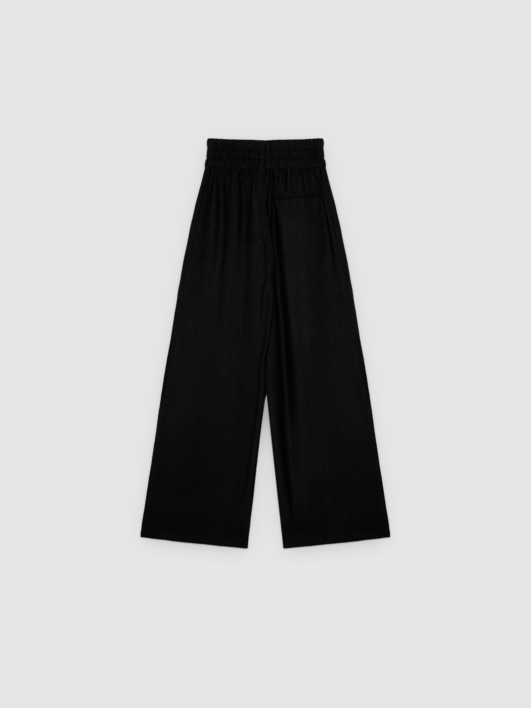 Pantalón wide leg fluido negro vista general frontal