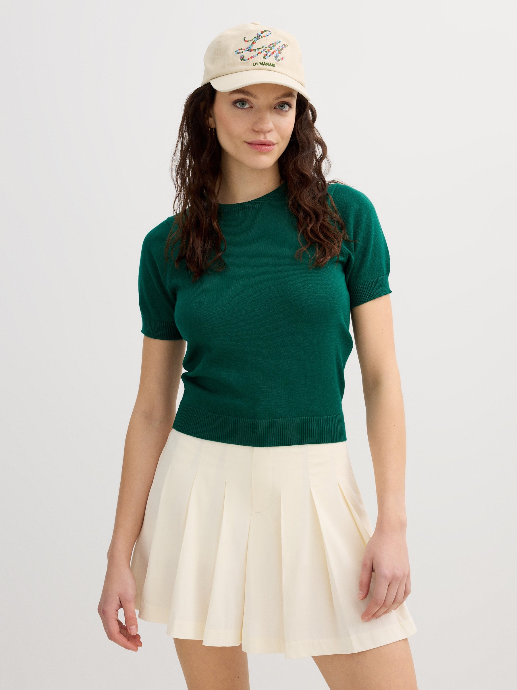 Pleated skort off white middle front view