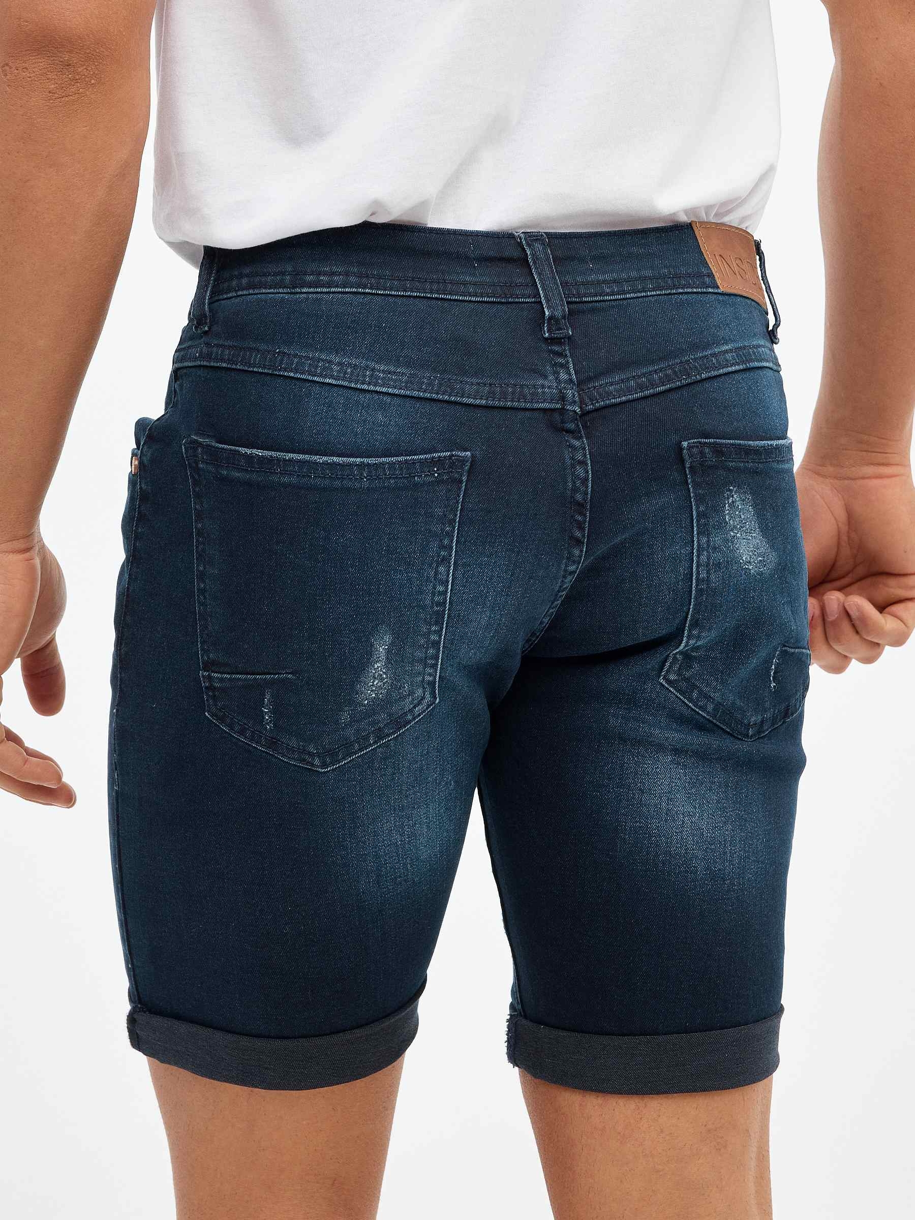 Bermuda jeans azul escuro rasgados
