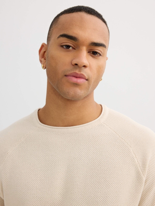 Textured knit sweater raw detail view