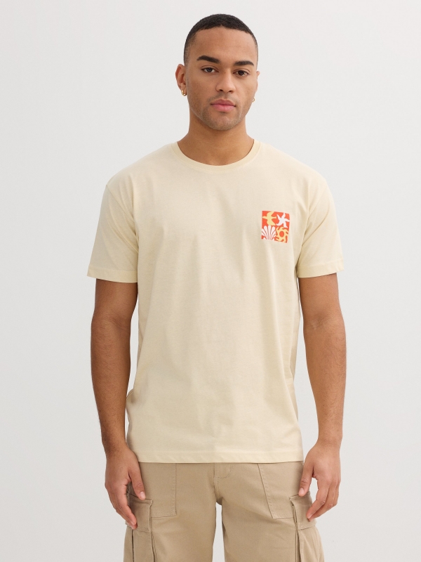 Camiseta azul print tropical arena vista media frontal