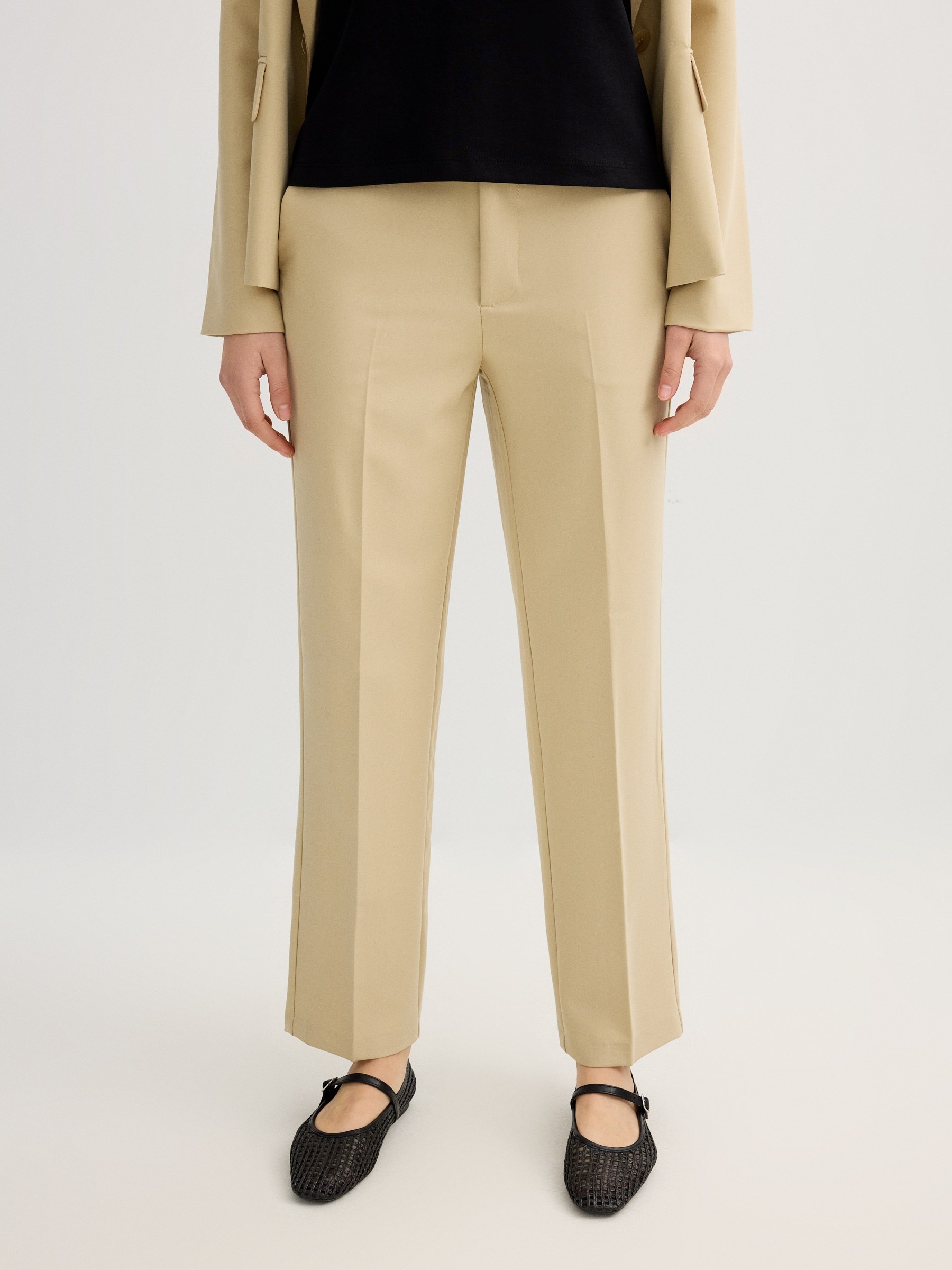 High-waisted pleated linen pants sand front view