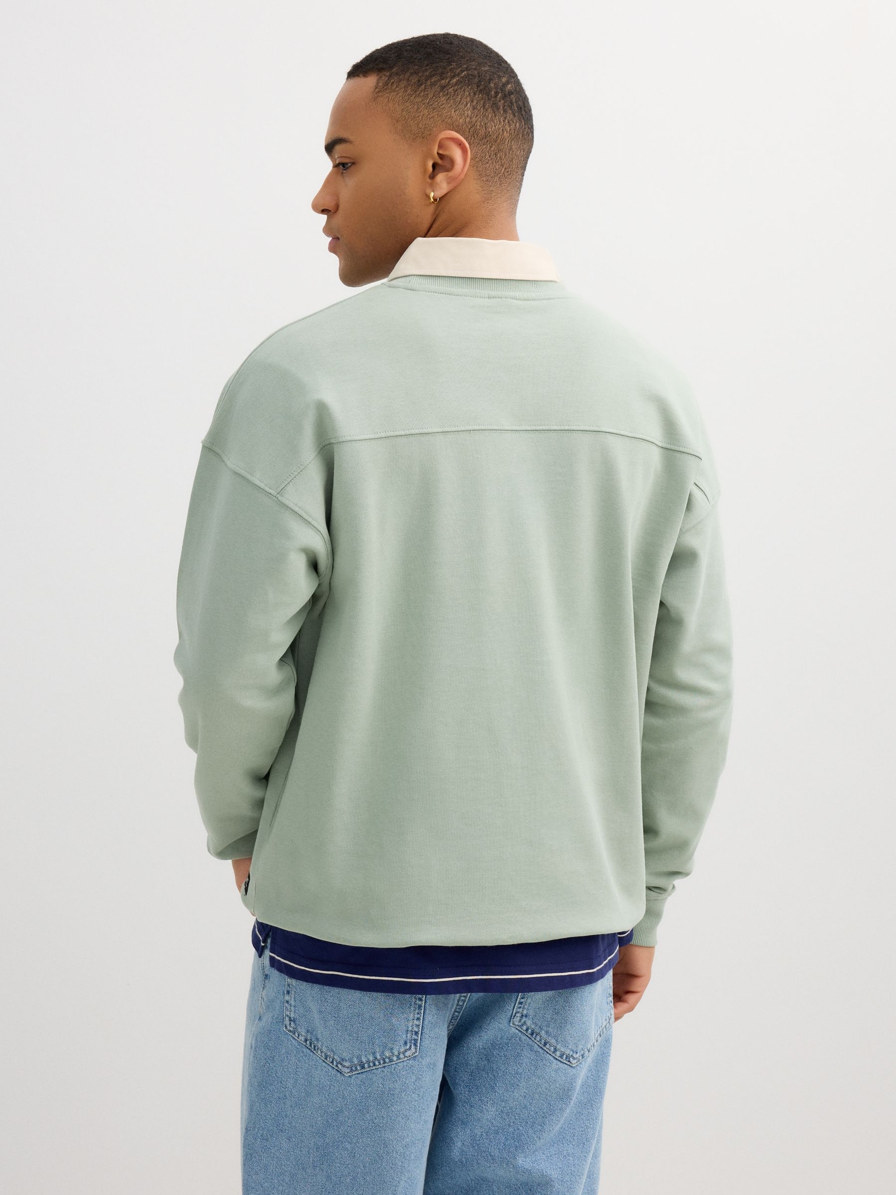 Fleece sweatshirt "West Champs" greyish green middle front view