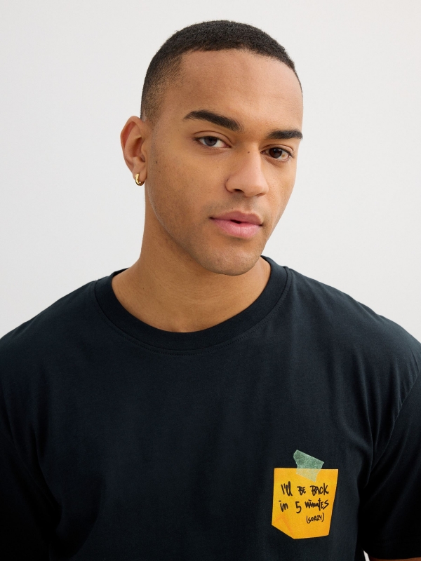 Black t-shirt with printed pocket grey detail view