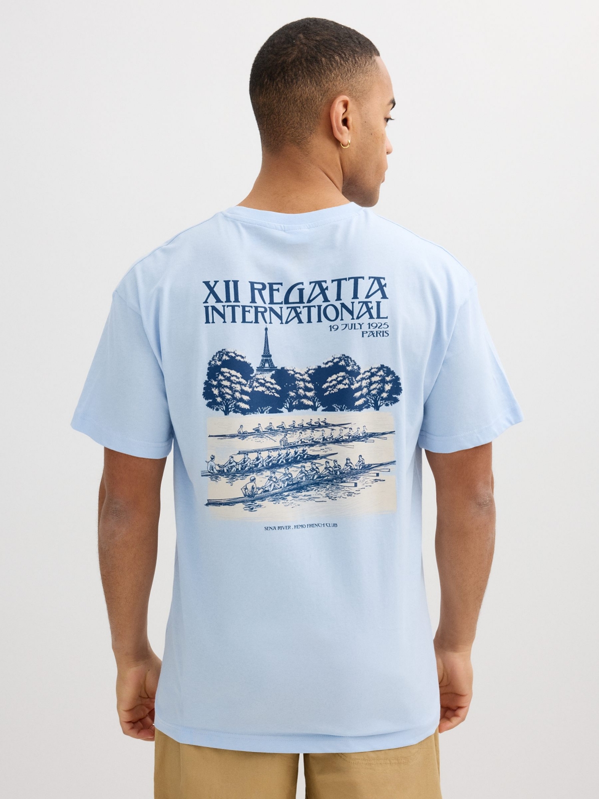 Blue shirt with minimal detail light blue middle back view