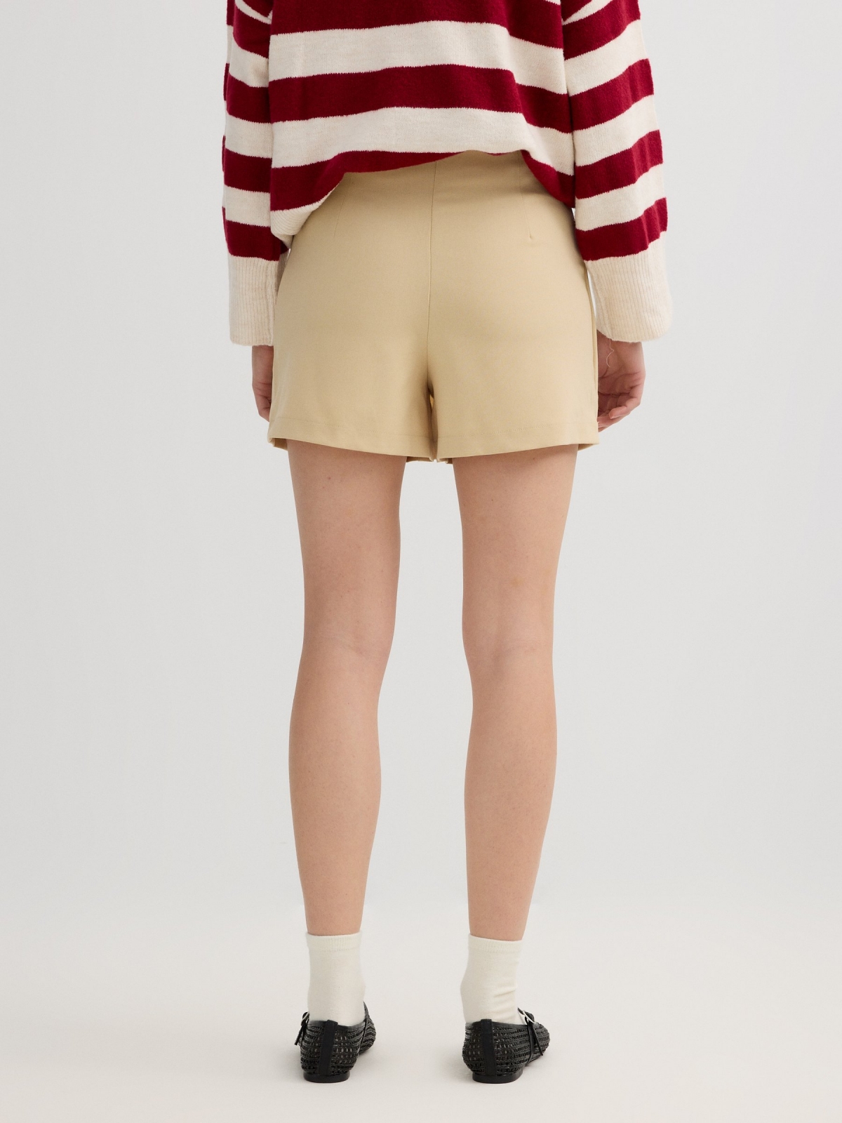 Beige skort with zipper ochre front view