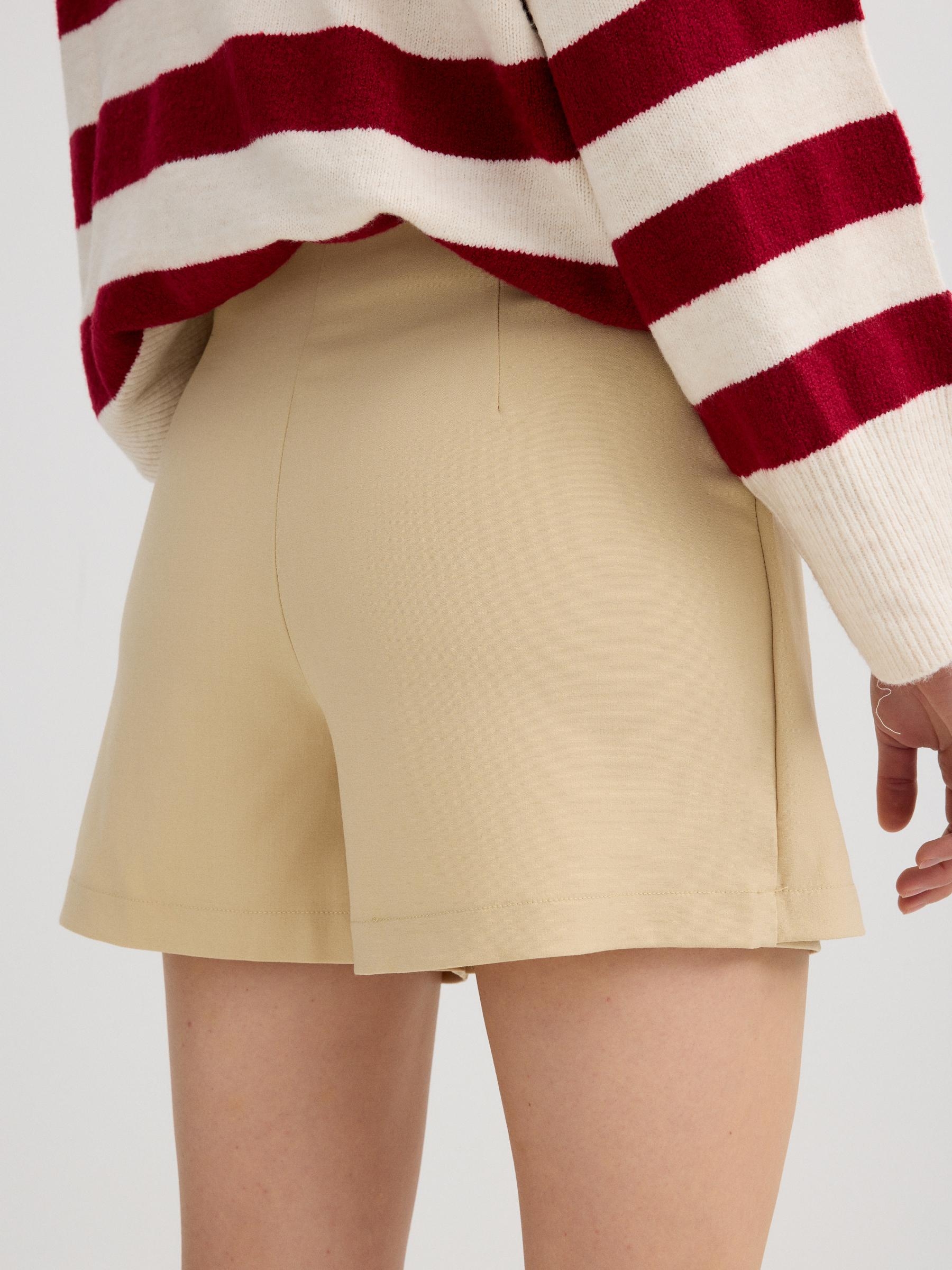 Beige skort with zipper ochre middle front view