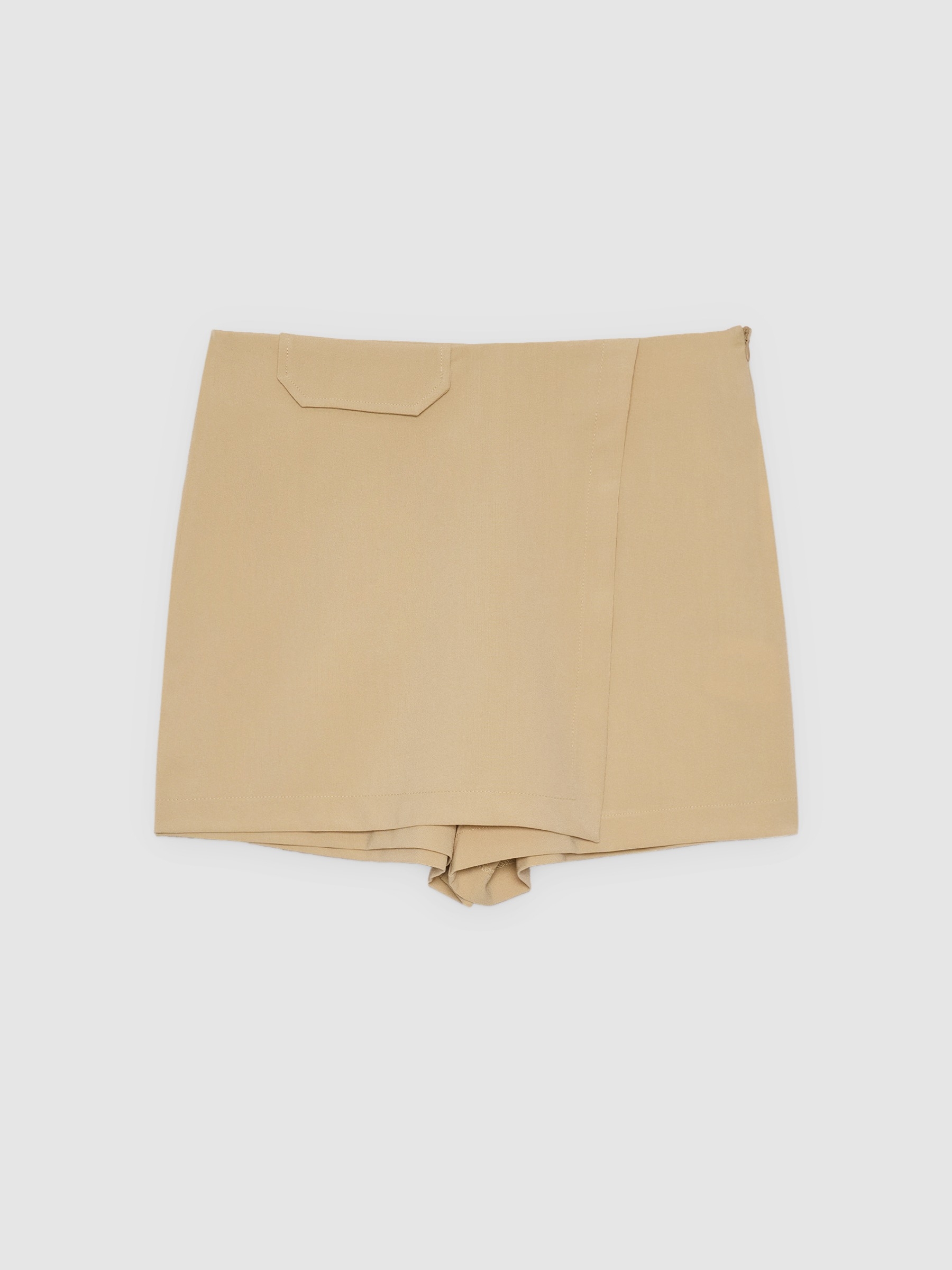 Falda pantalón beige con cremallera ocre vista media frontal