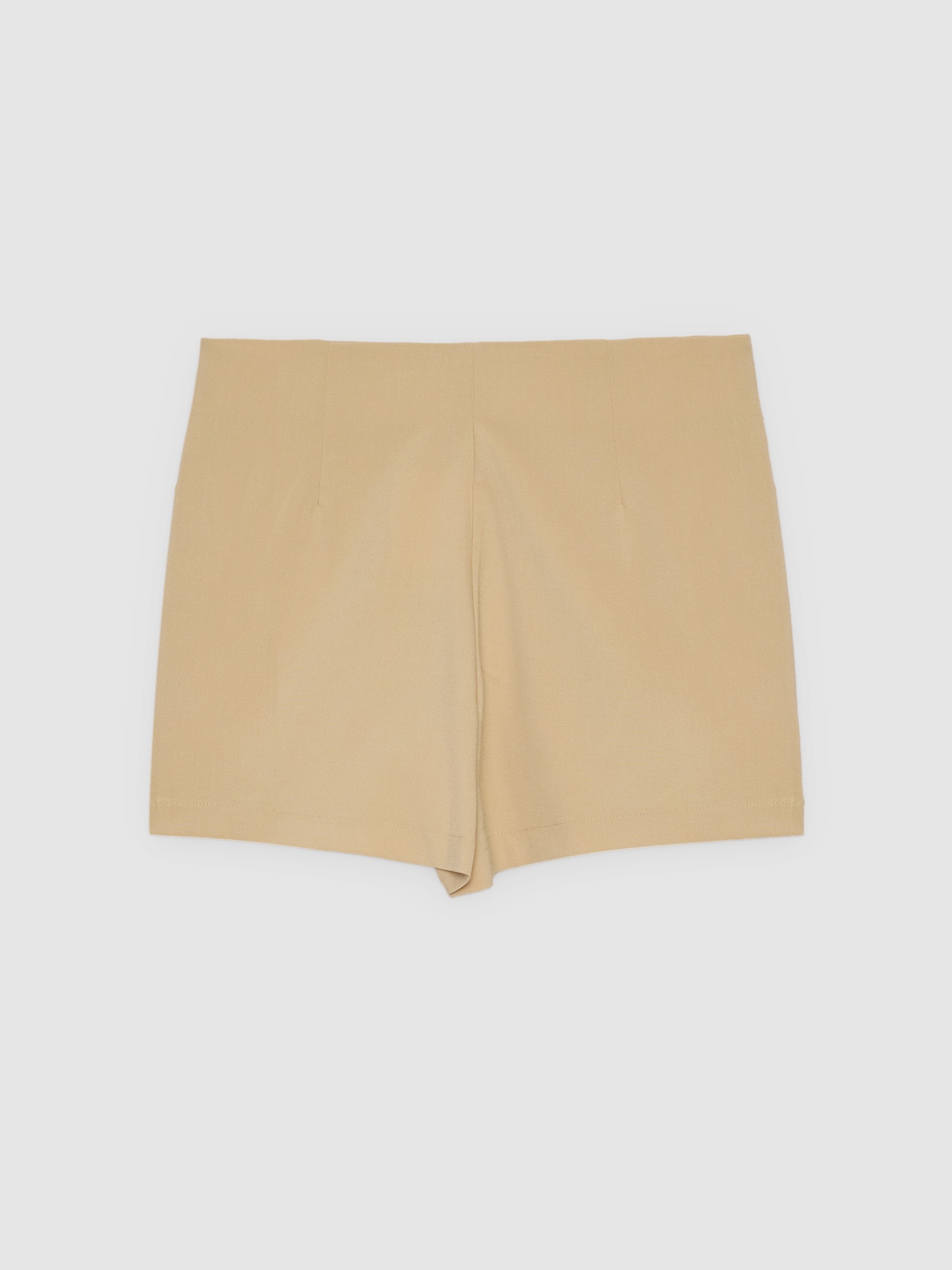 Saia-calça bege com zíper ocre vista meia frontal