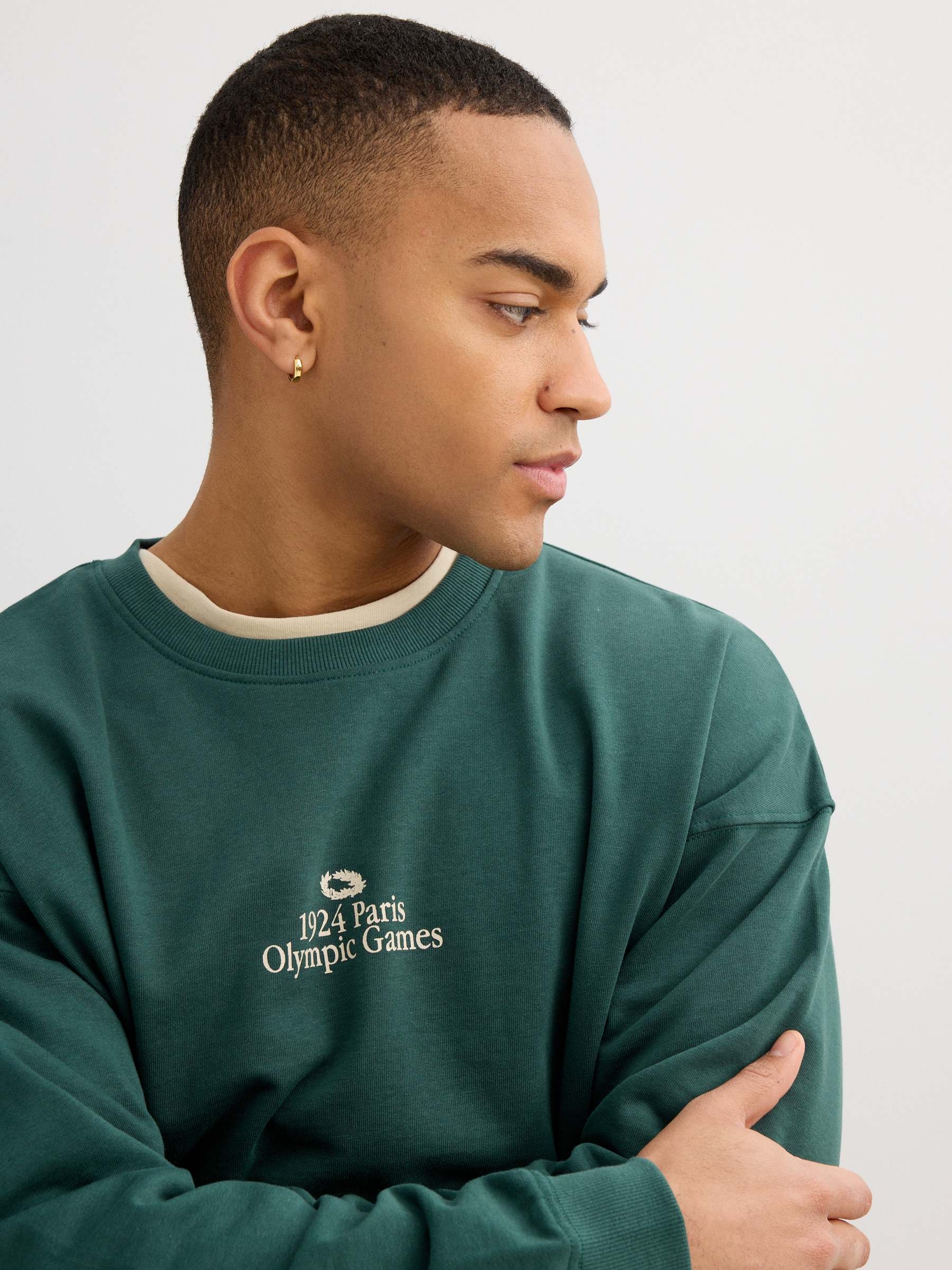 Oversized fleece sweatshirt text dark green middle front view