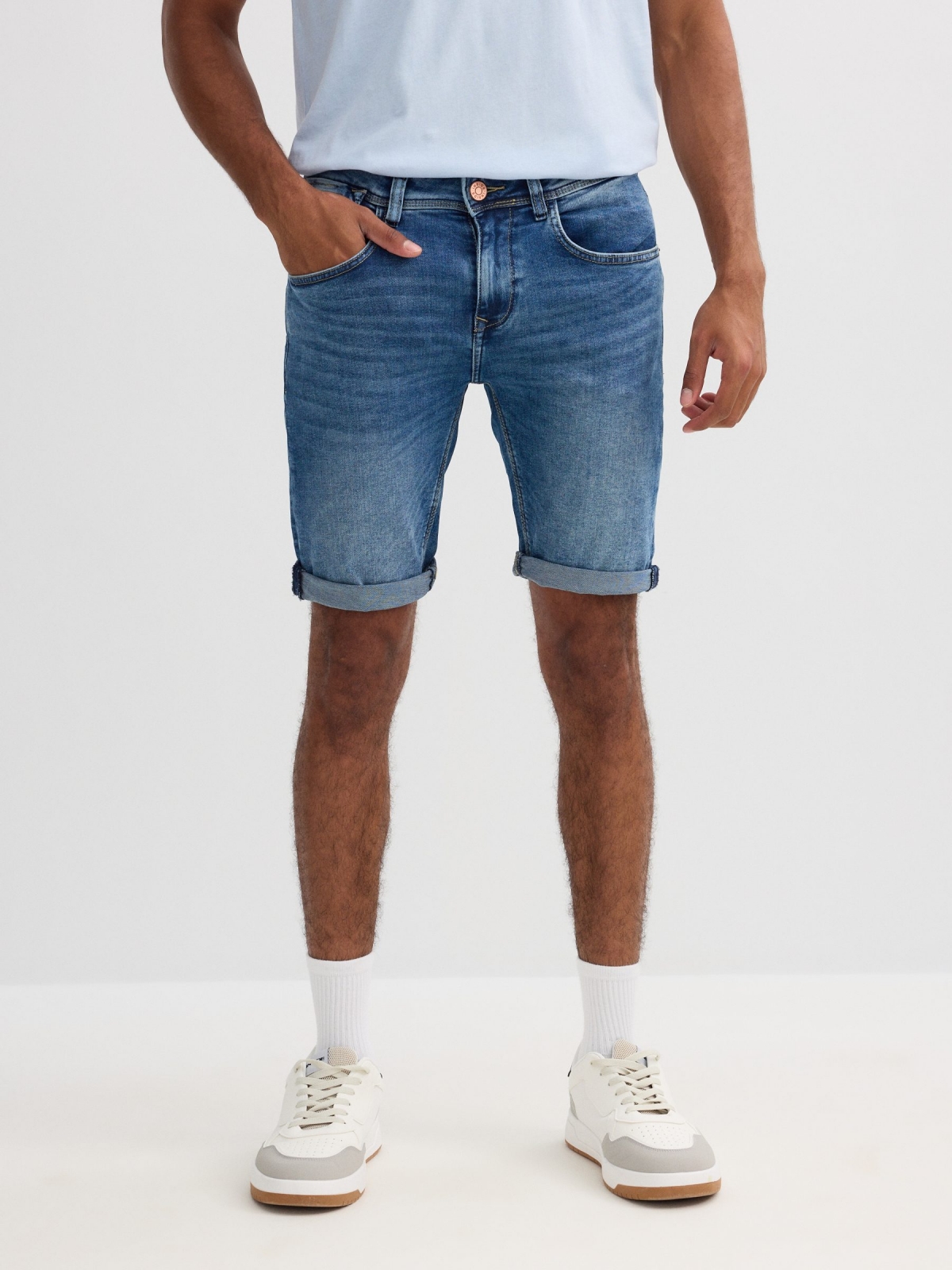 Slim five-pocket denim Bermuda shorts blue front view