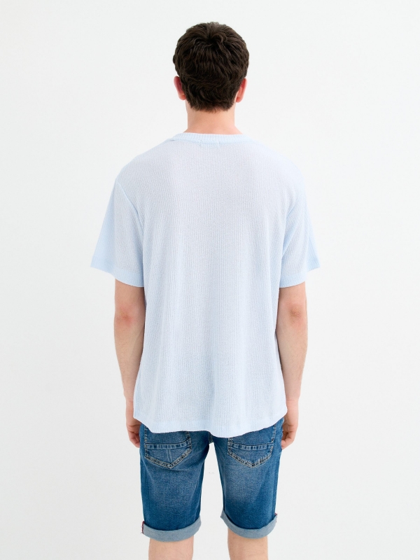 Calça jeans skinny azul vista meia traseira