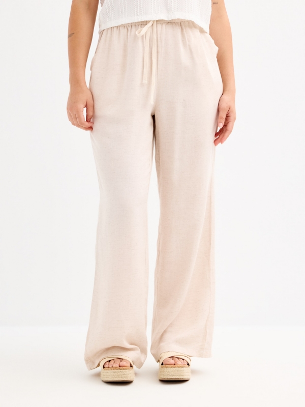Fluid high-waisted linen pants beige middle front view
