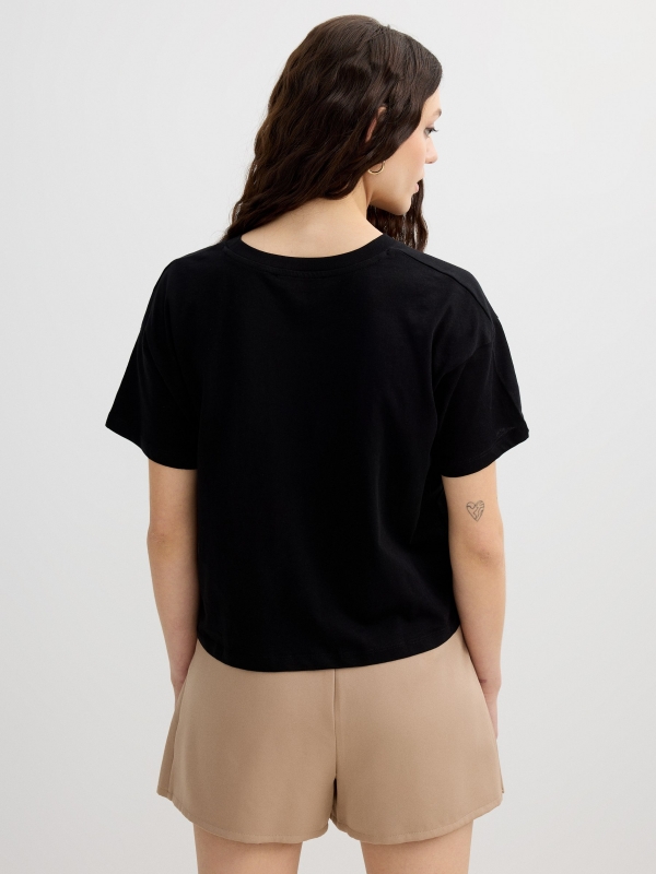 Camiseta gráfica de algodón negro vista media trasera