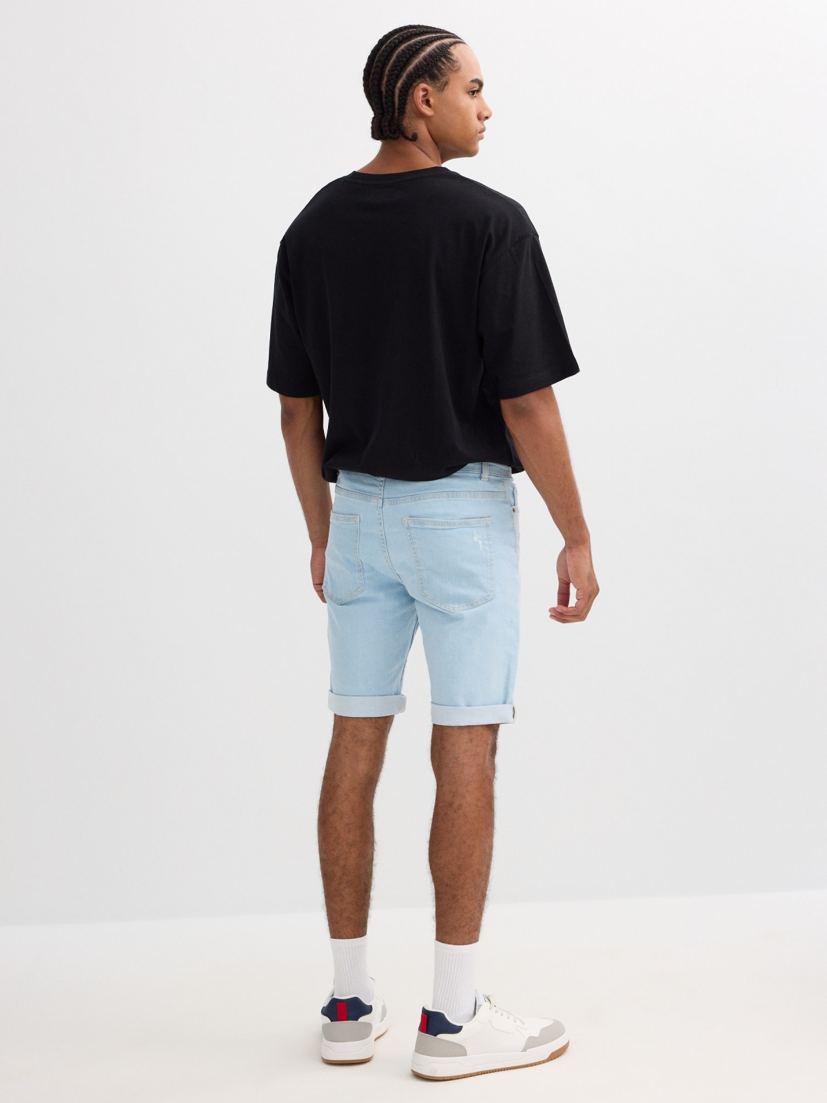 Bermudas jeans rasgadas cinco bolsos azul vista meia traseira