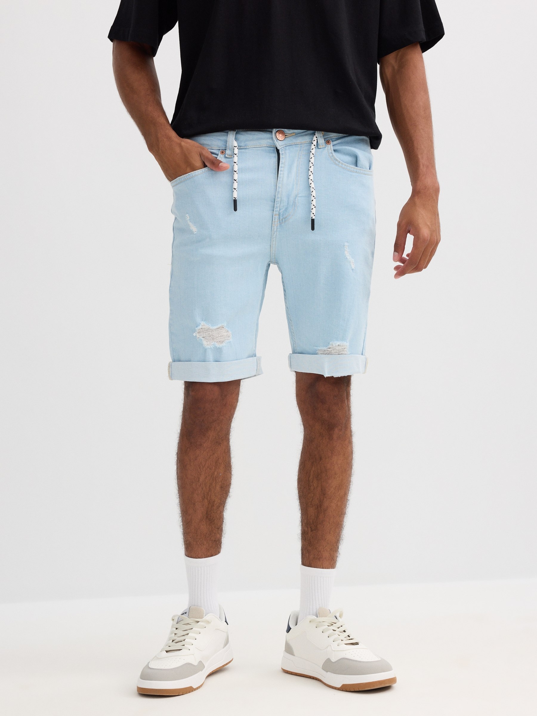 Ripped denim Bermuda shorts five pockets blue middle front view