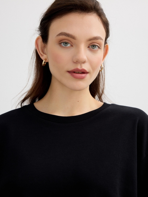 Sky blue oversized t-shirt black detail view