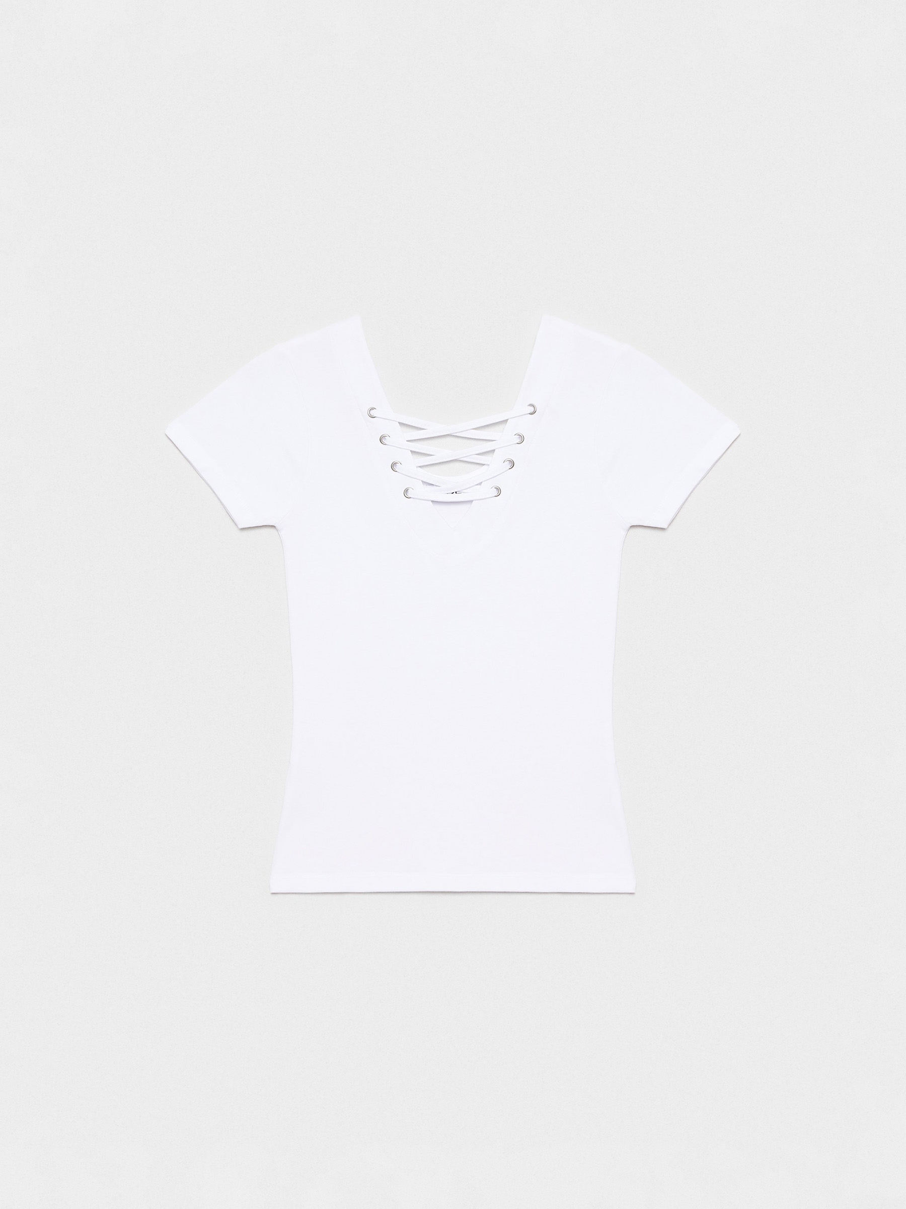 Black strappy neckline top white middle front view