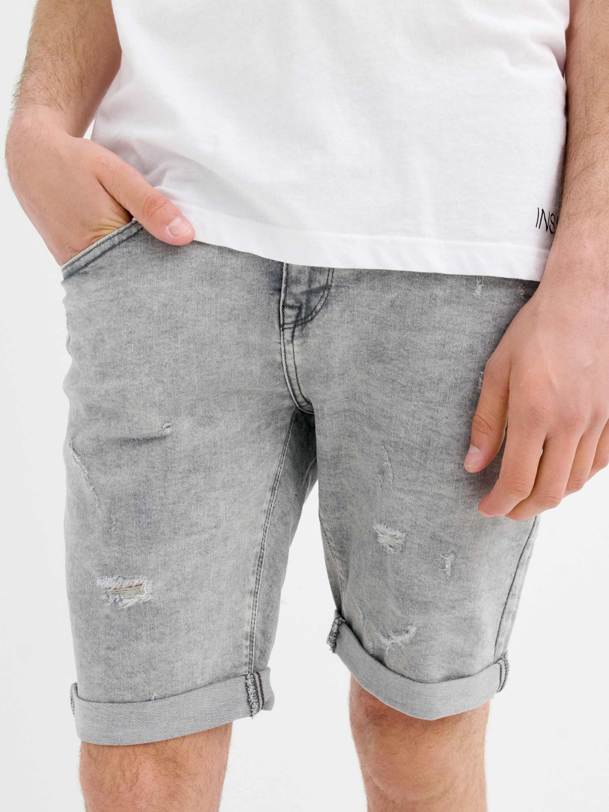 Grey skinny denim Bermuda shorts light grey middle back view