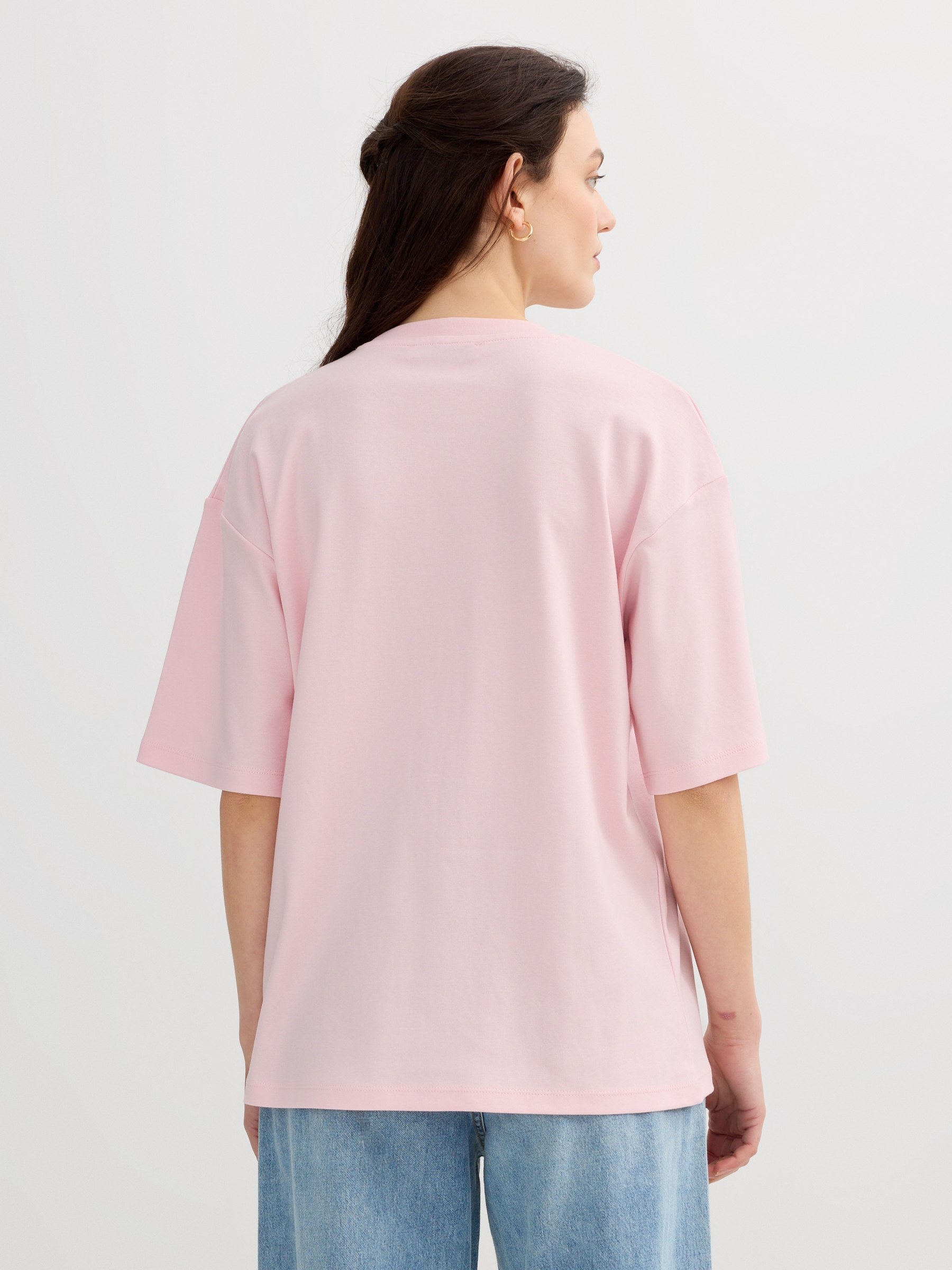 Camiseta oversize algodão rosa claro vista meia frontal