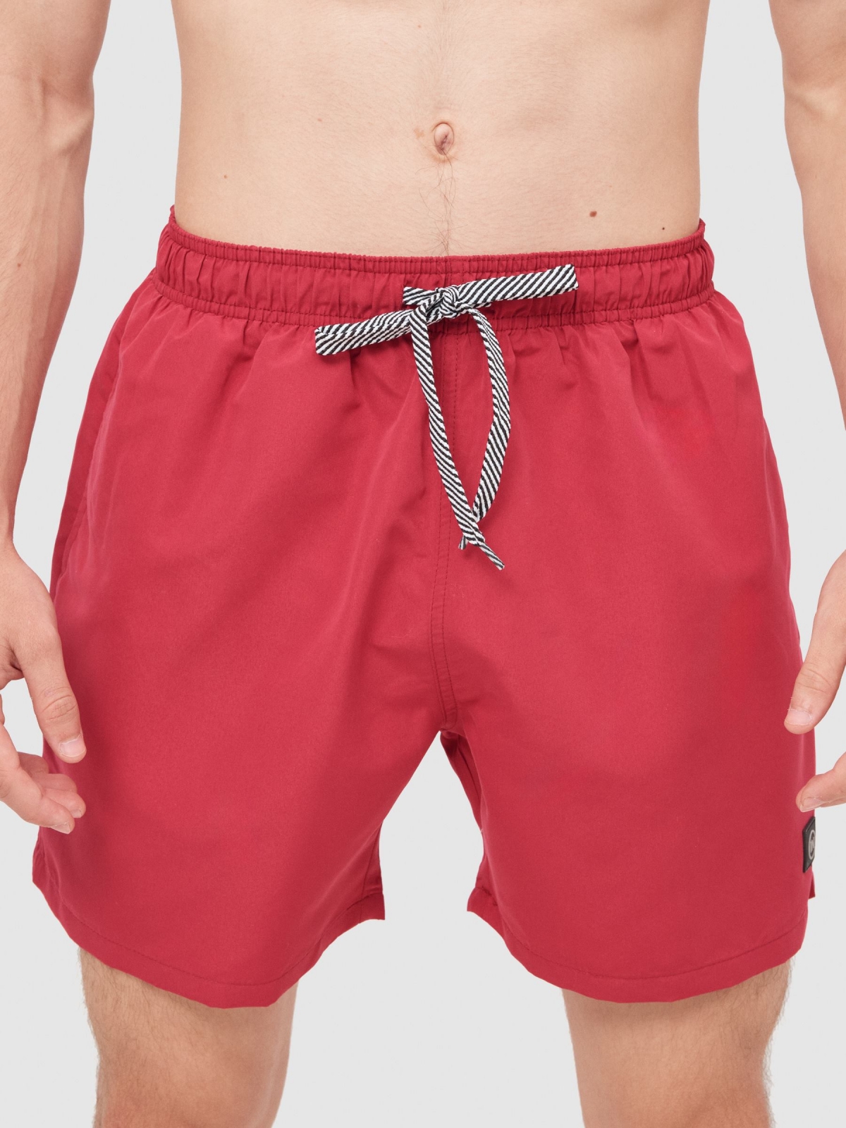 Basic swimsuit with pockets red front detail view