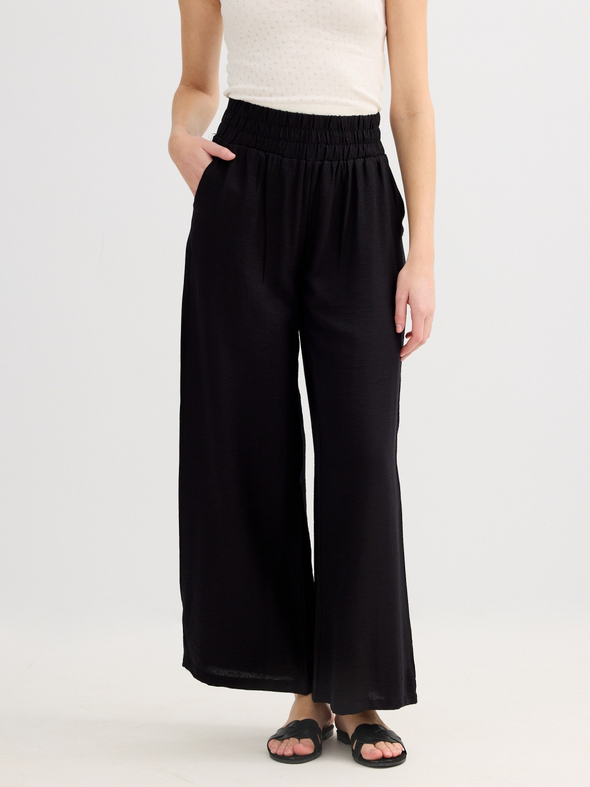 Flowy wide-leg pants black middle front view