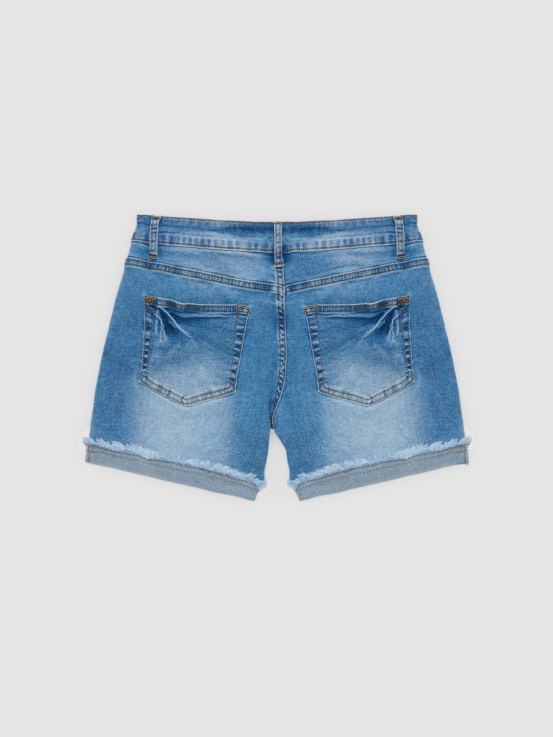 Short denim bajo desflecado vuelta