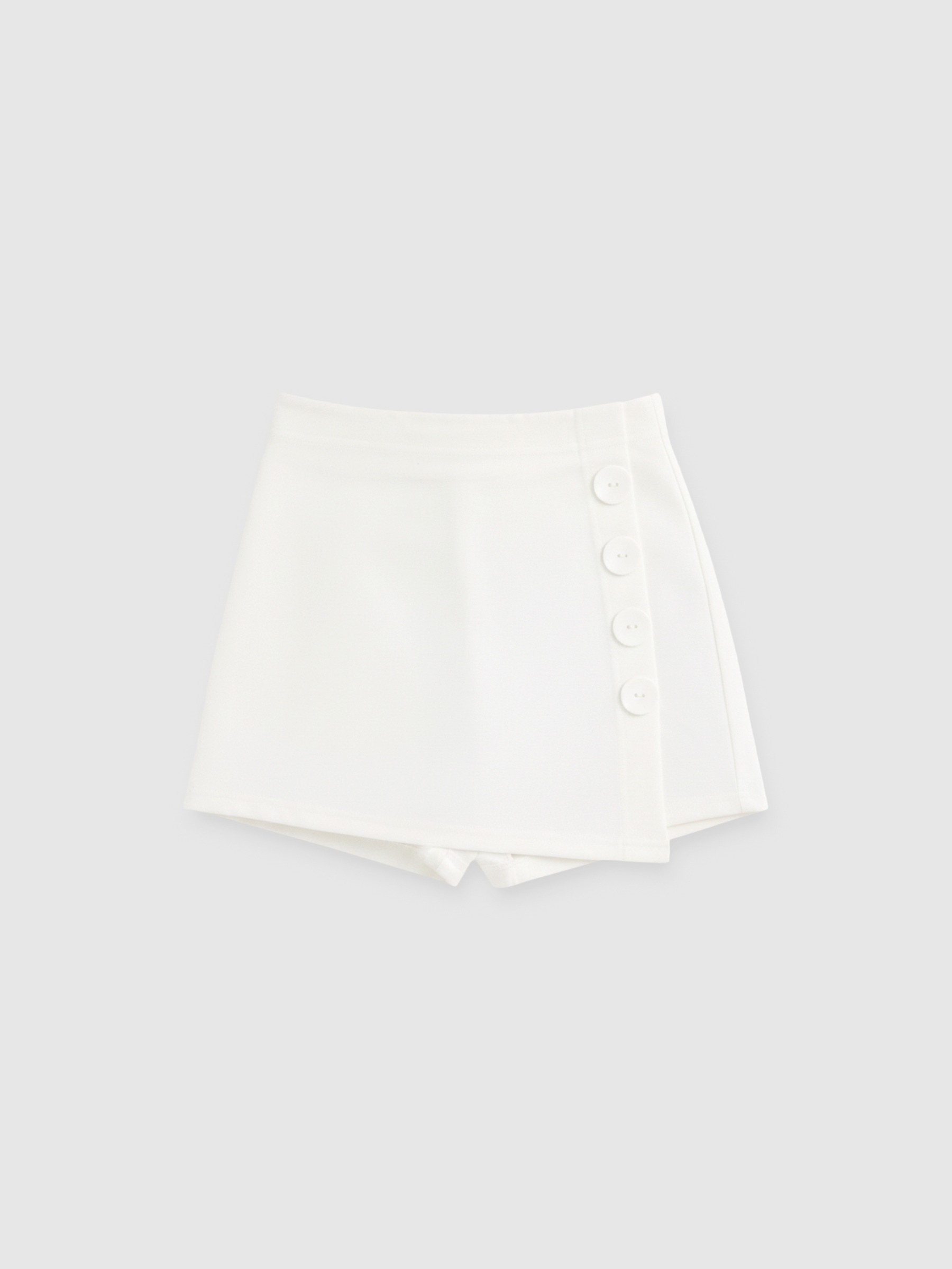 Buttoned skort white middle front view